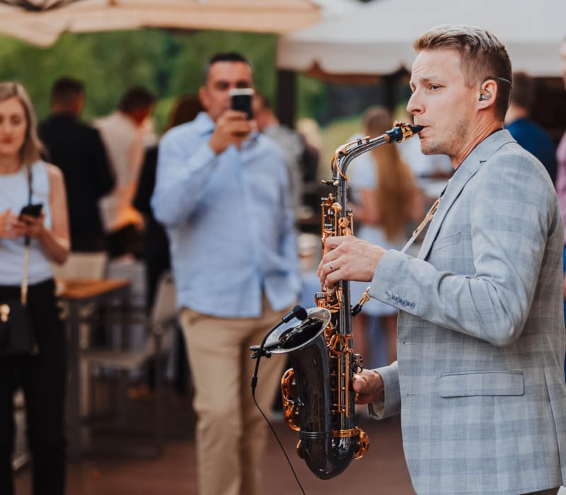 a person playing a saxophone