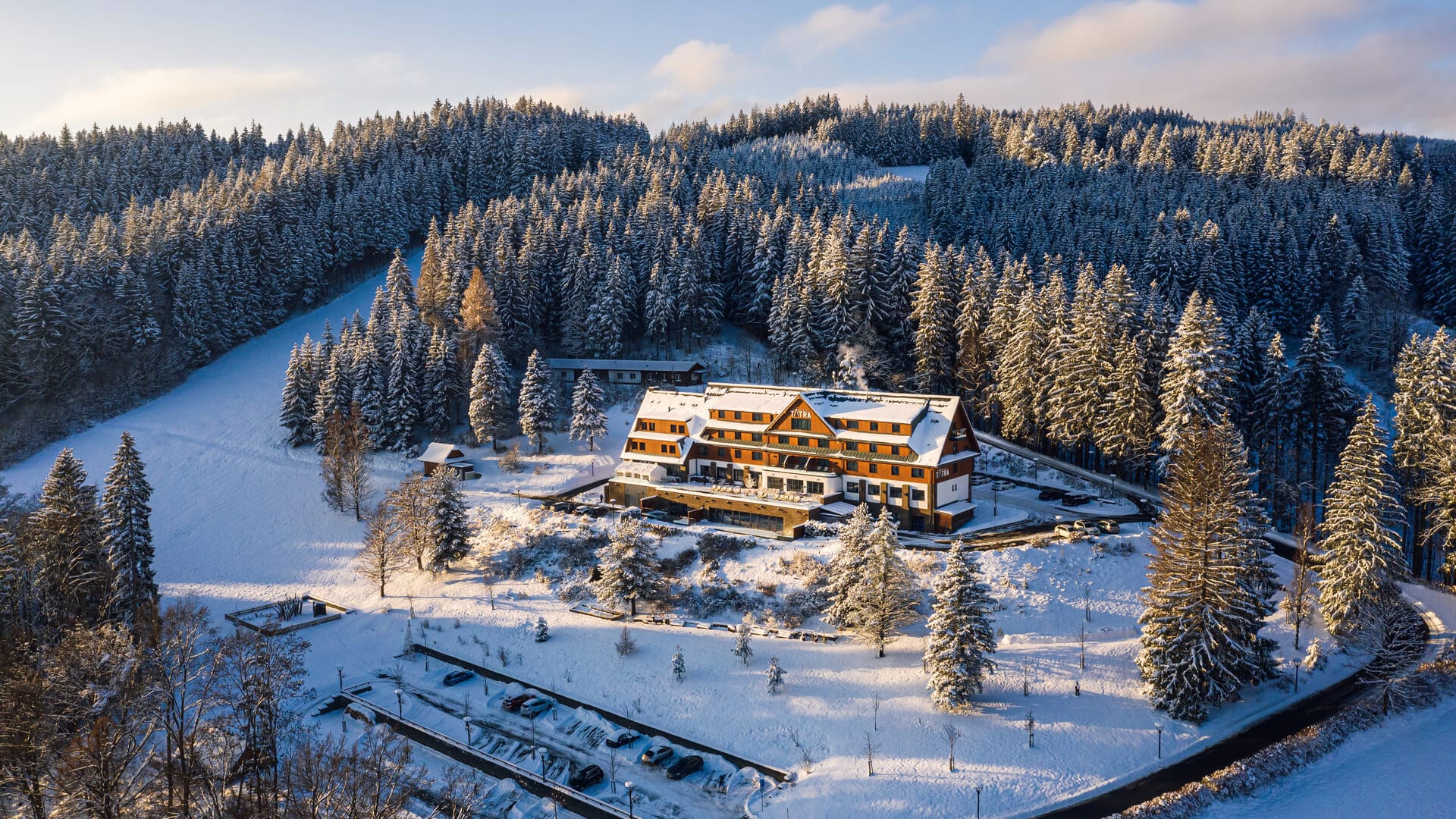 a house on a snowy hill