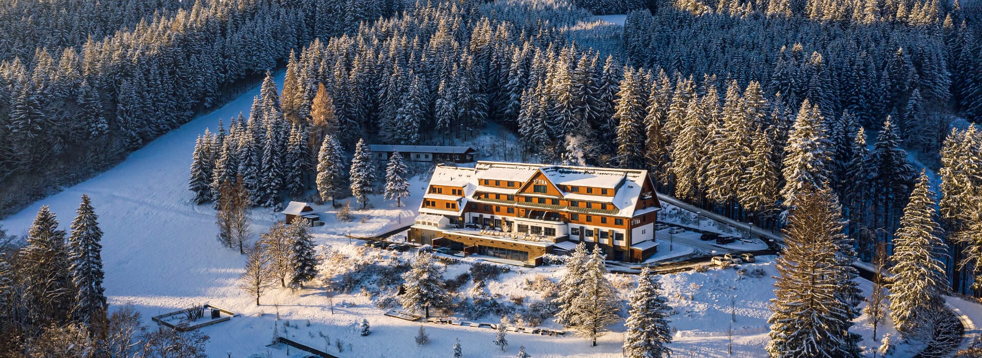a house on a snowy hill