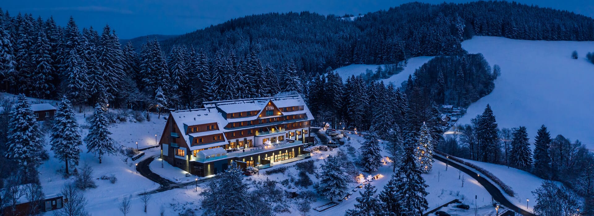 a house on a snowy mountain