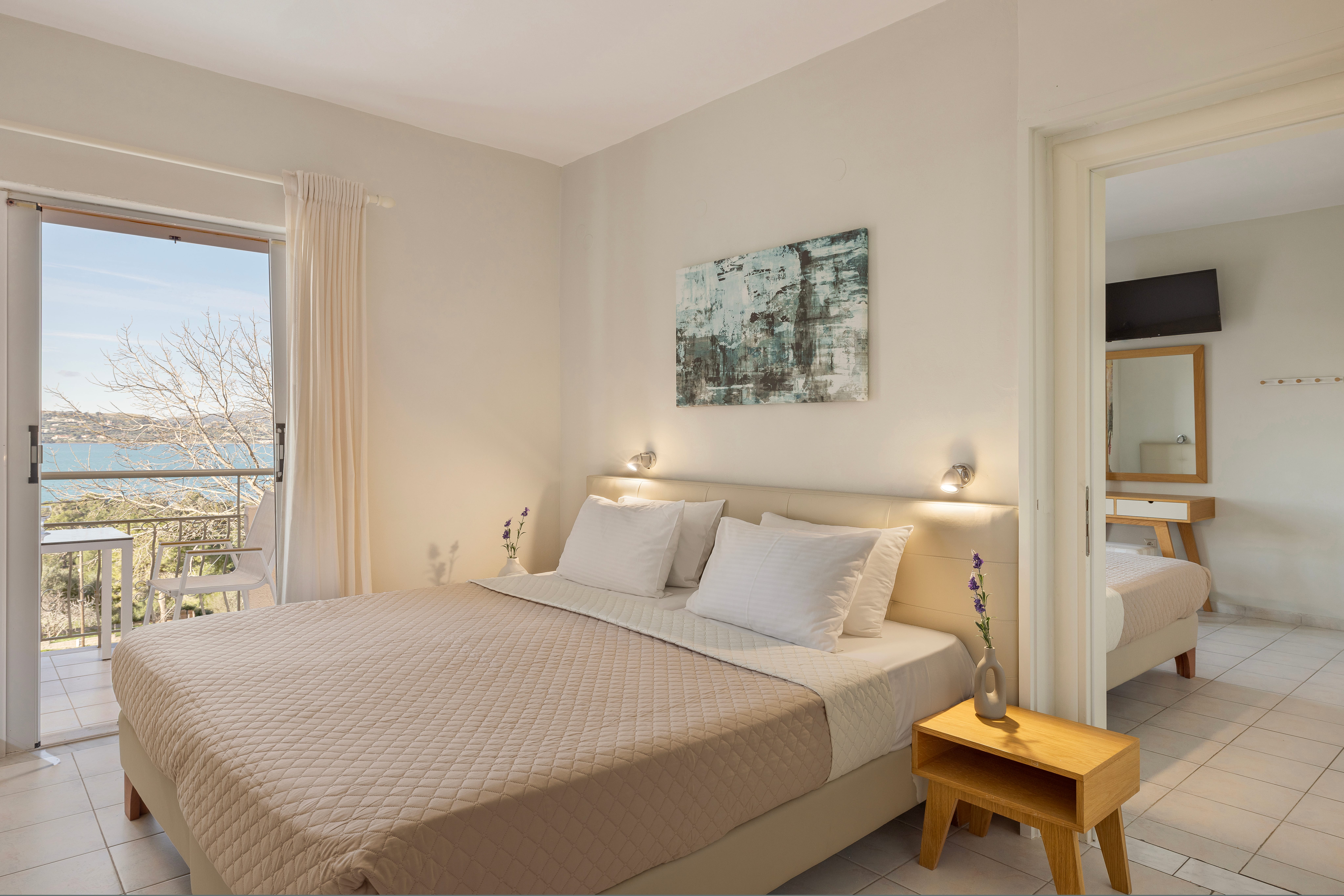 a bedroom with a large window