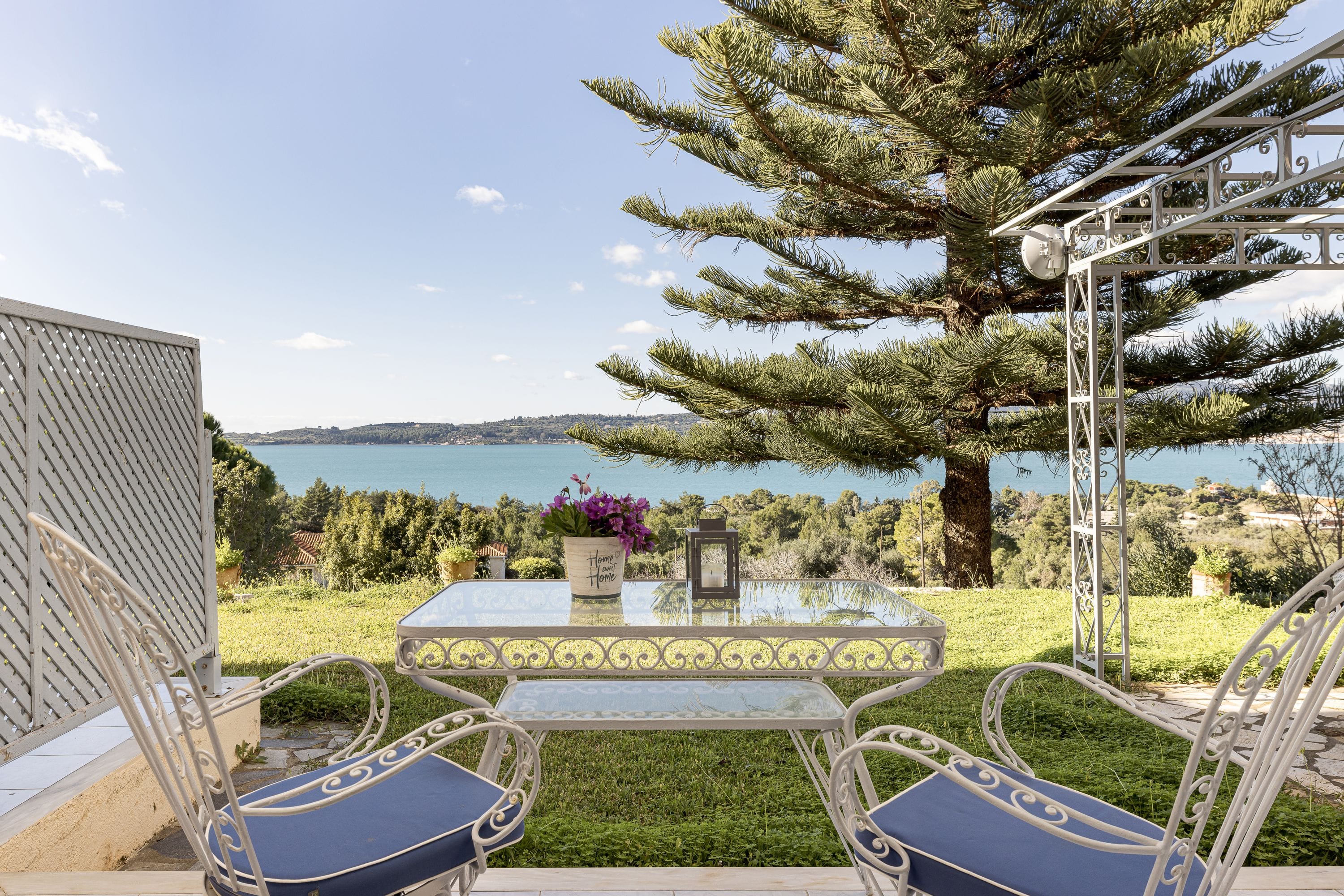 a table and chairs on a deck