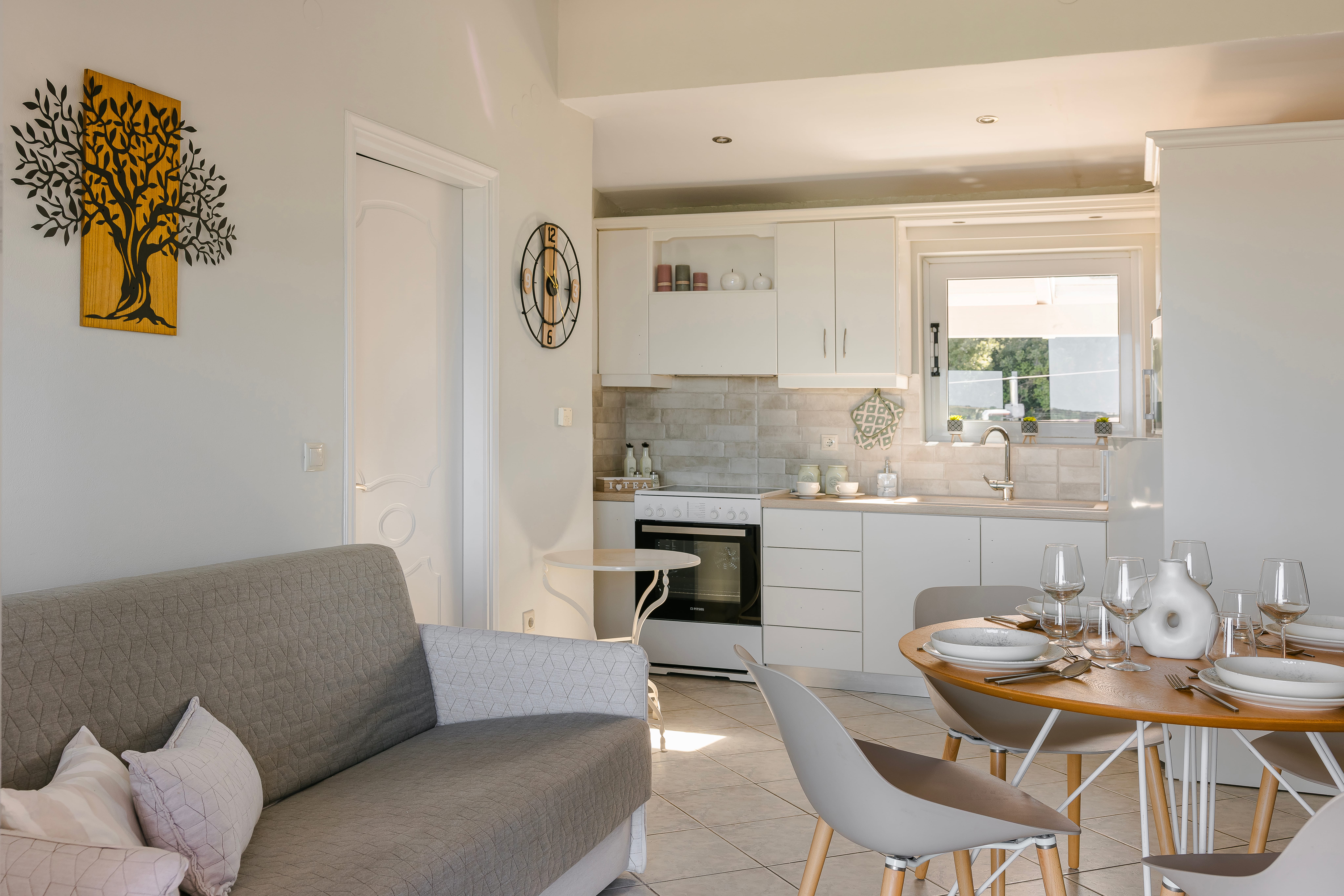 a living room with a couch and a table