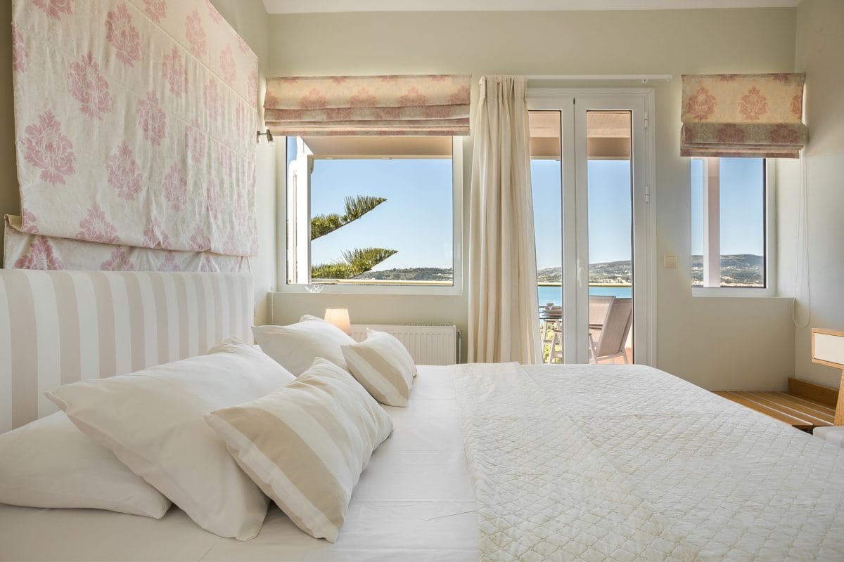 a bed with white sheets