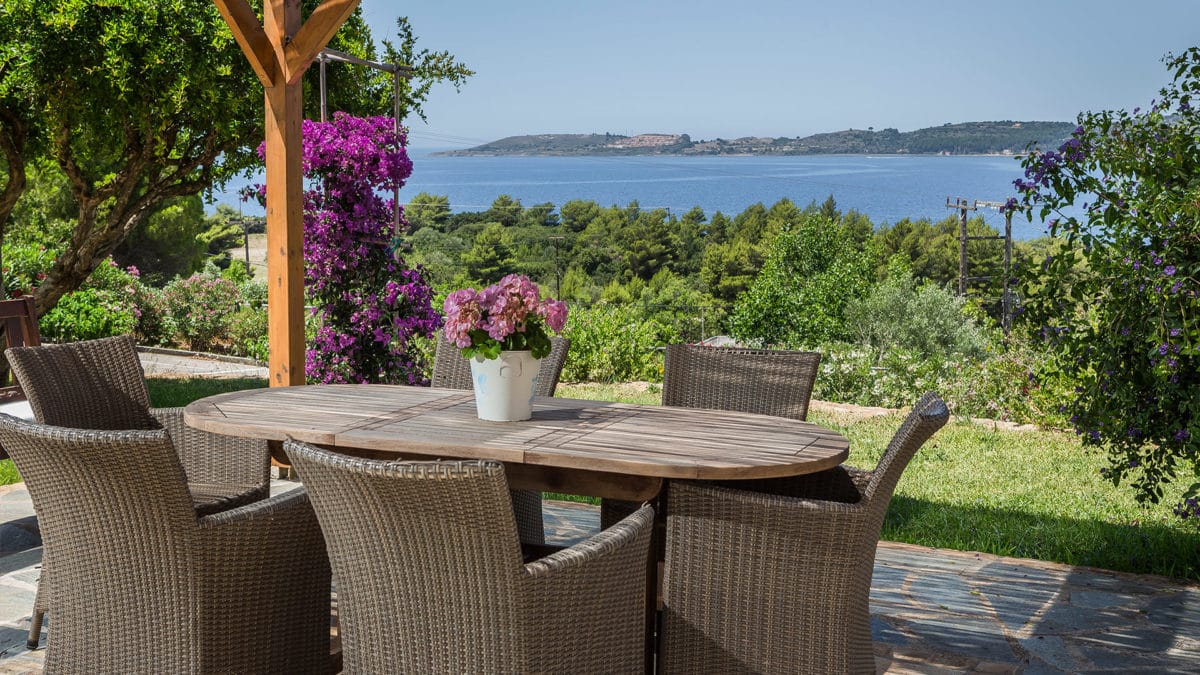 a table and chairs on a patio