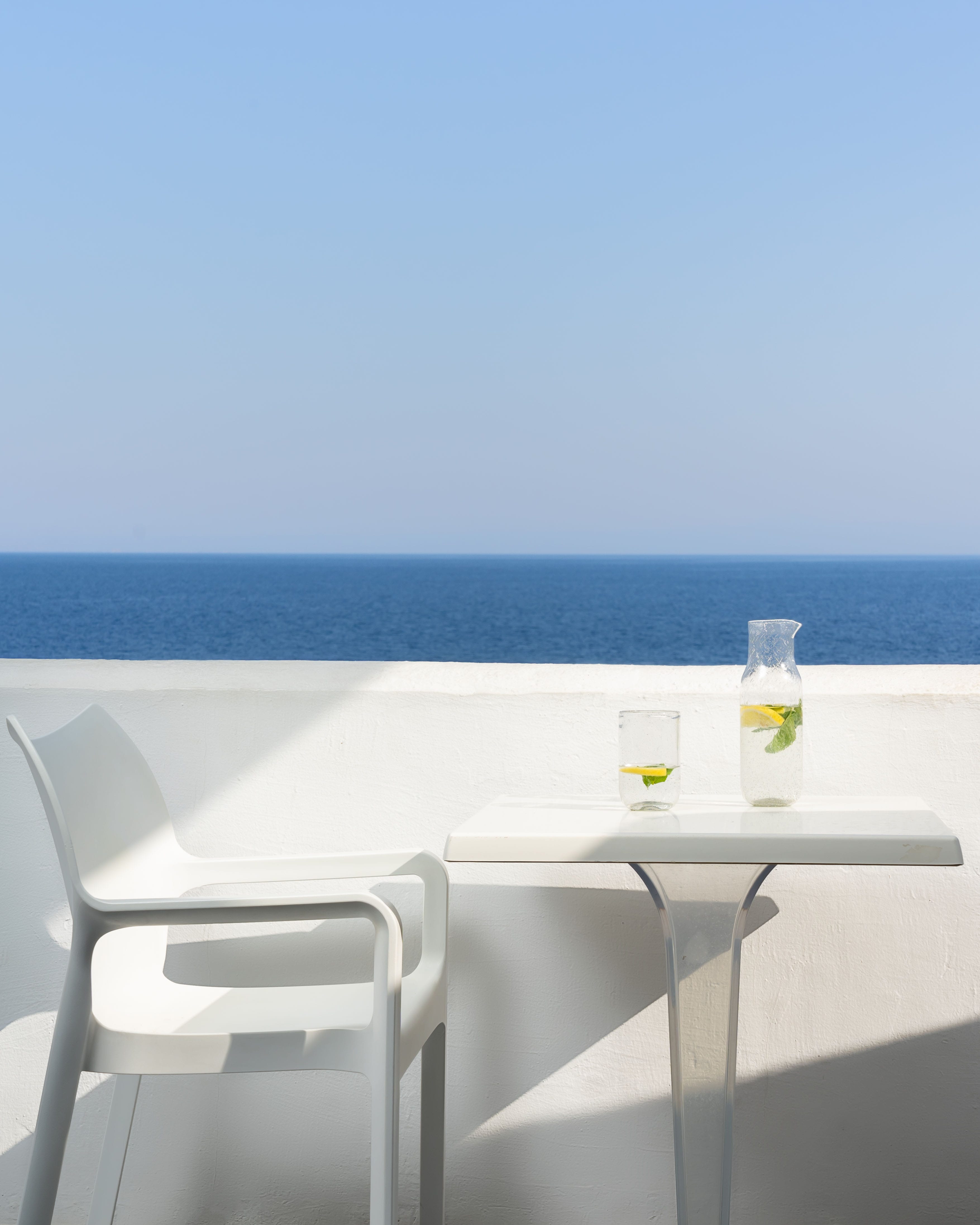 a table and chairs on a deck