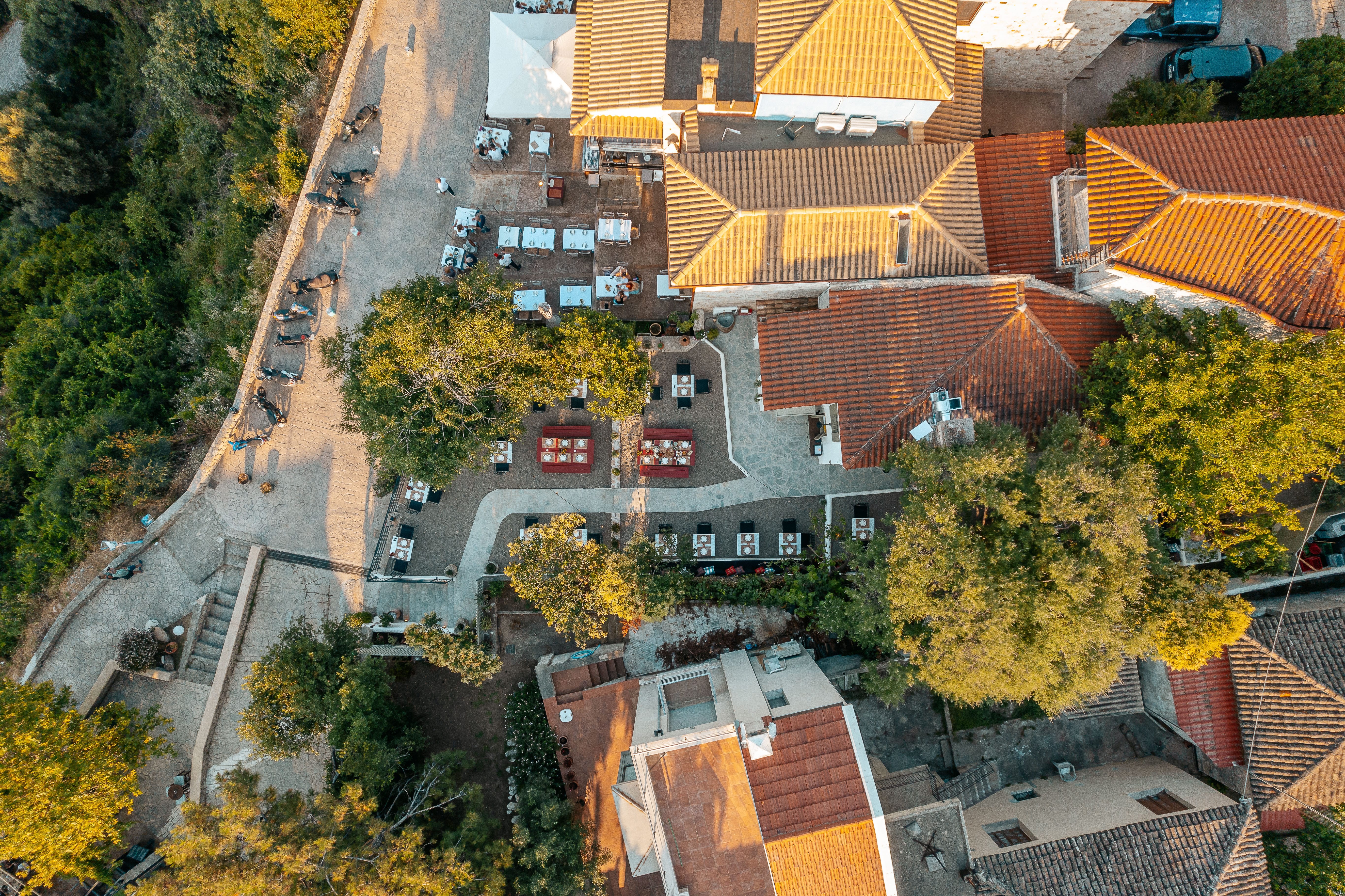 a group of buildings with trees