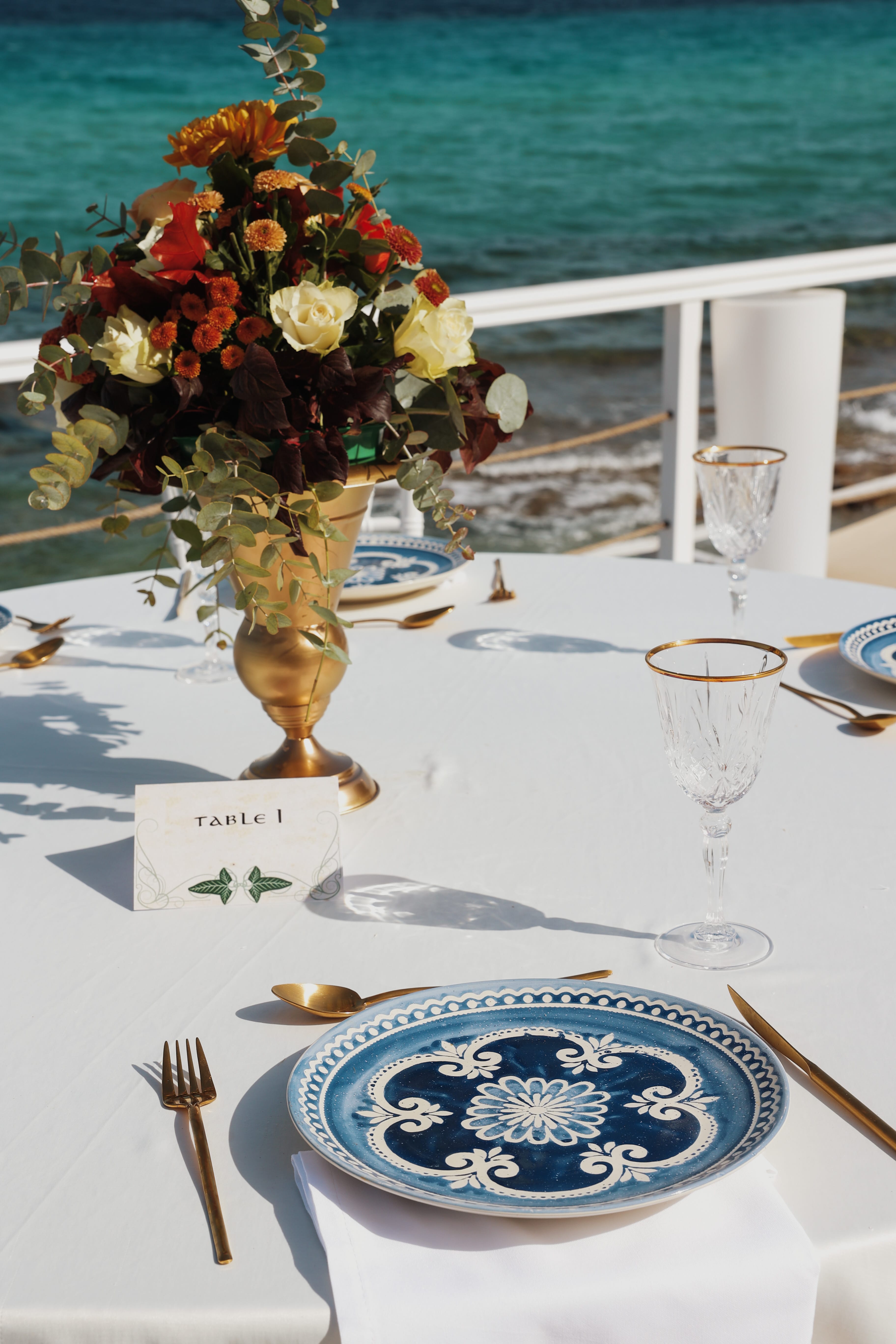a vase with flowers on a table