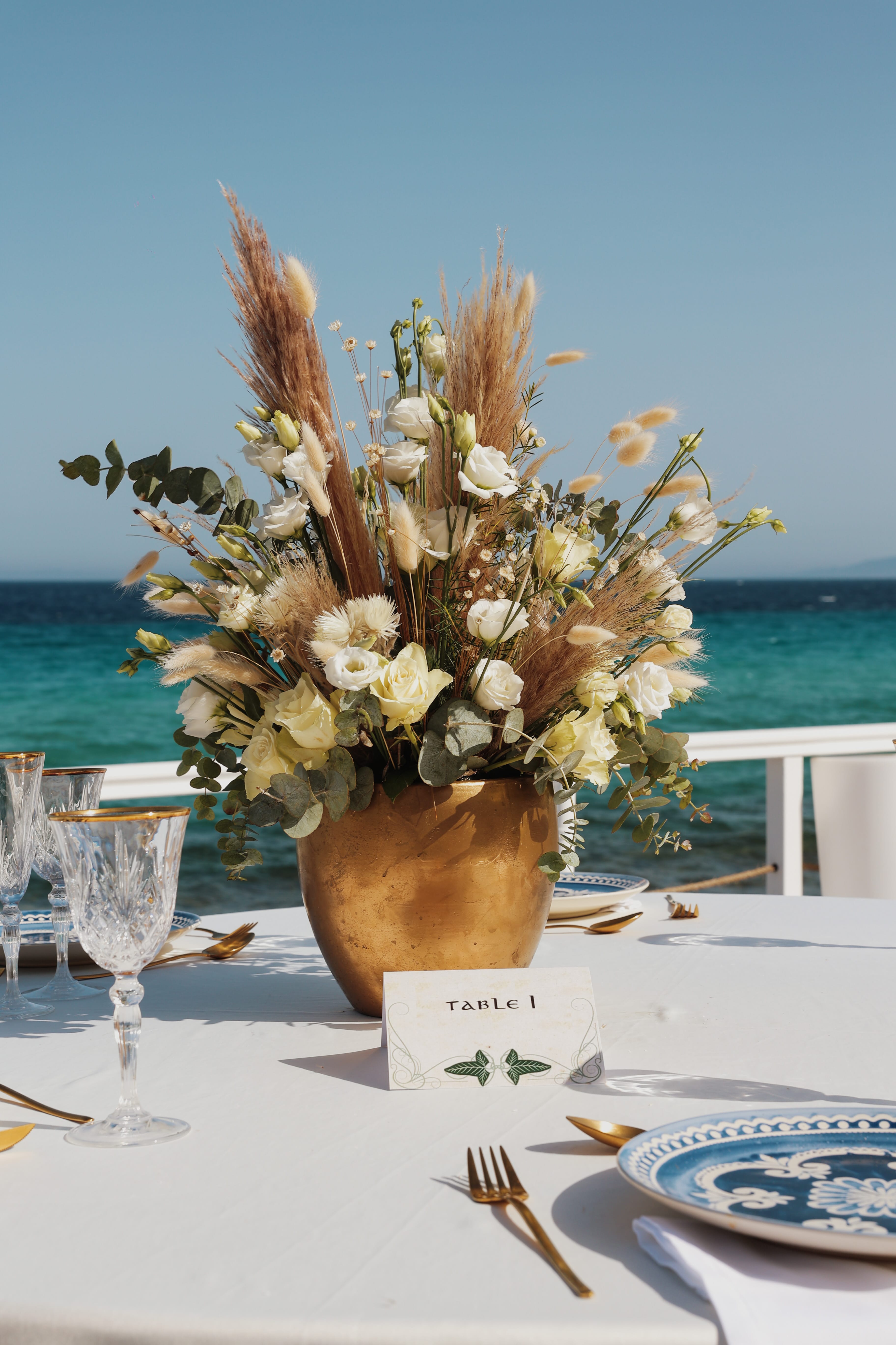 a vase with flowers on a table
