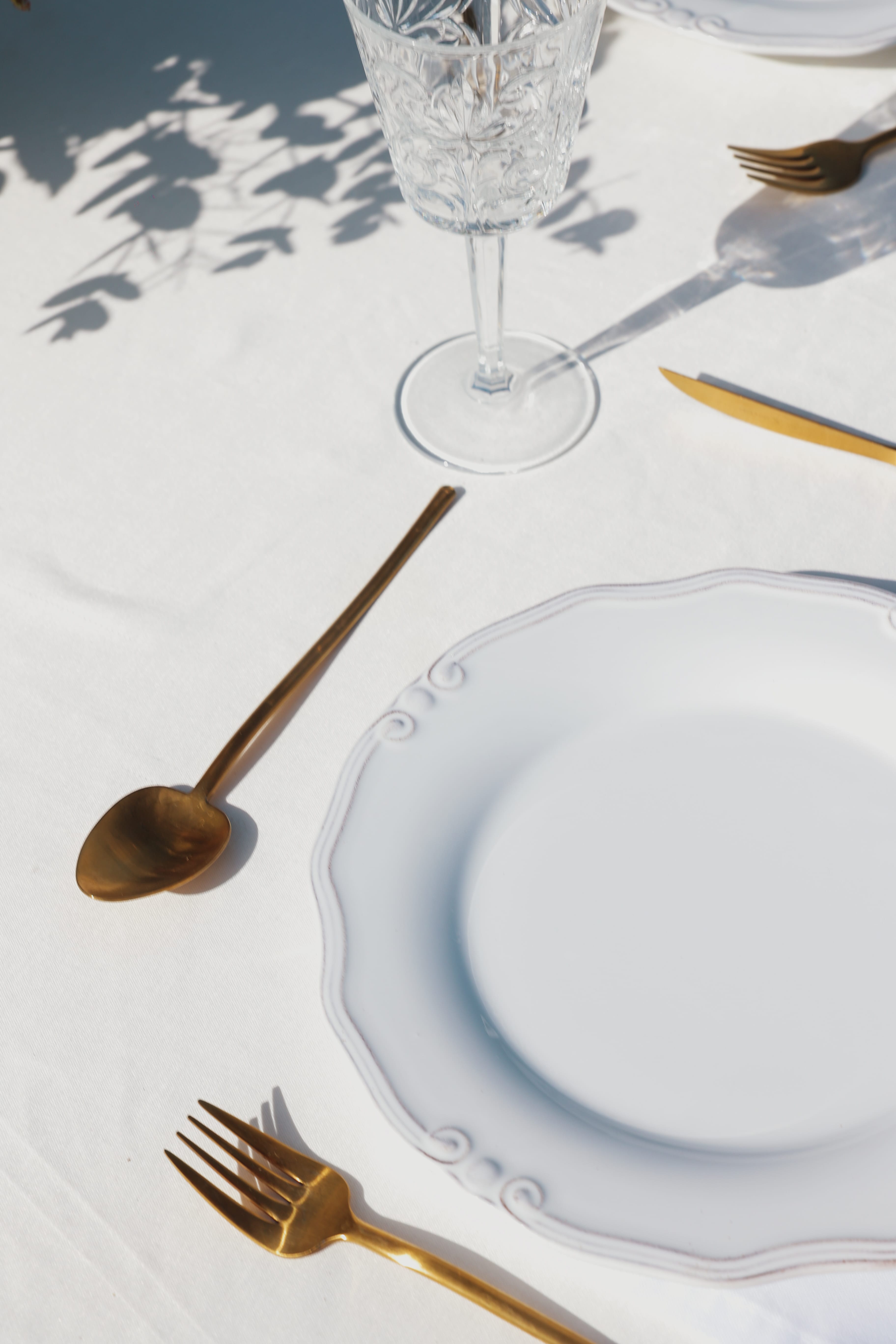 a plate and silverware on a table