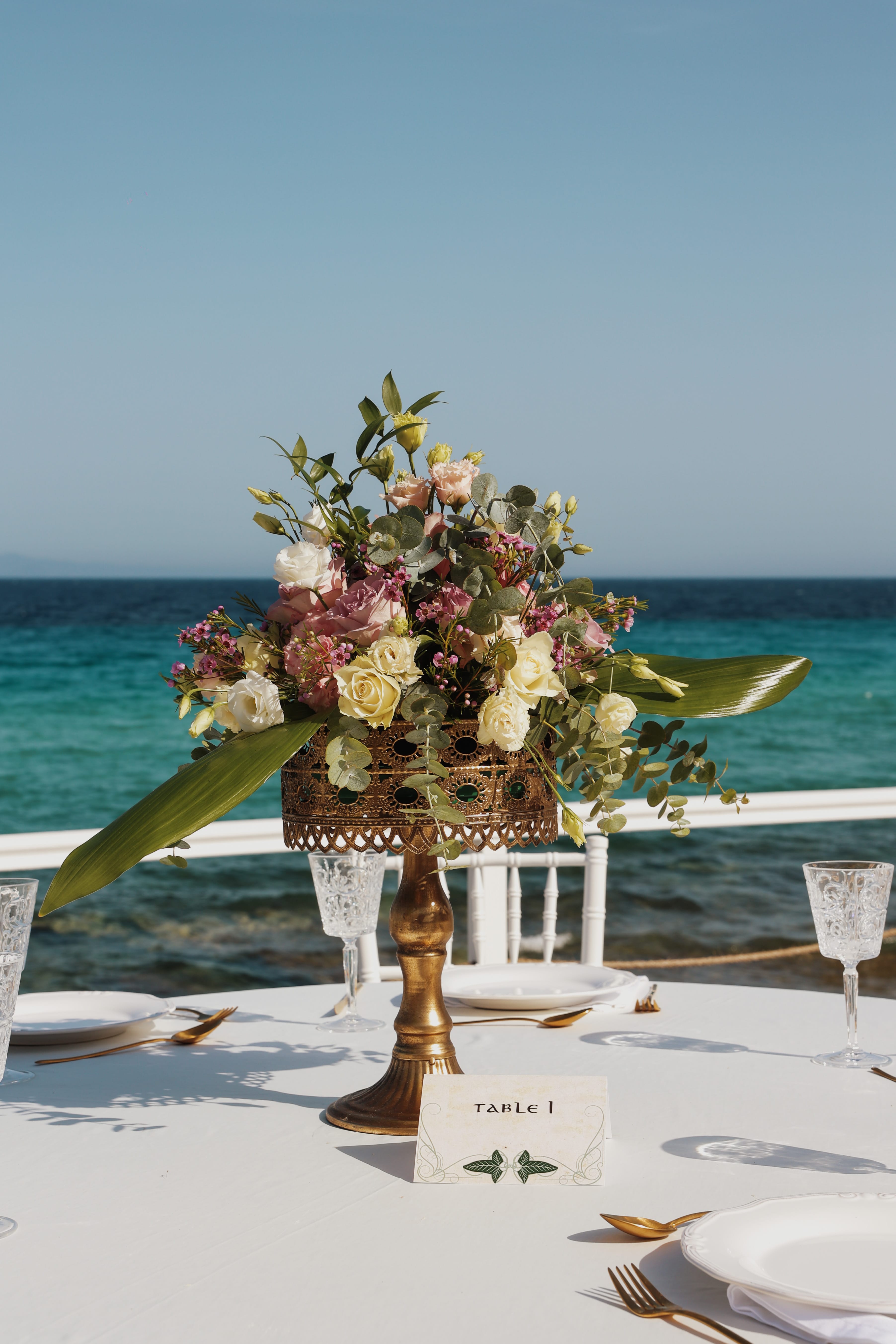a vase with flowers on a table