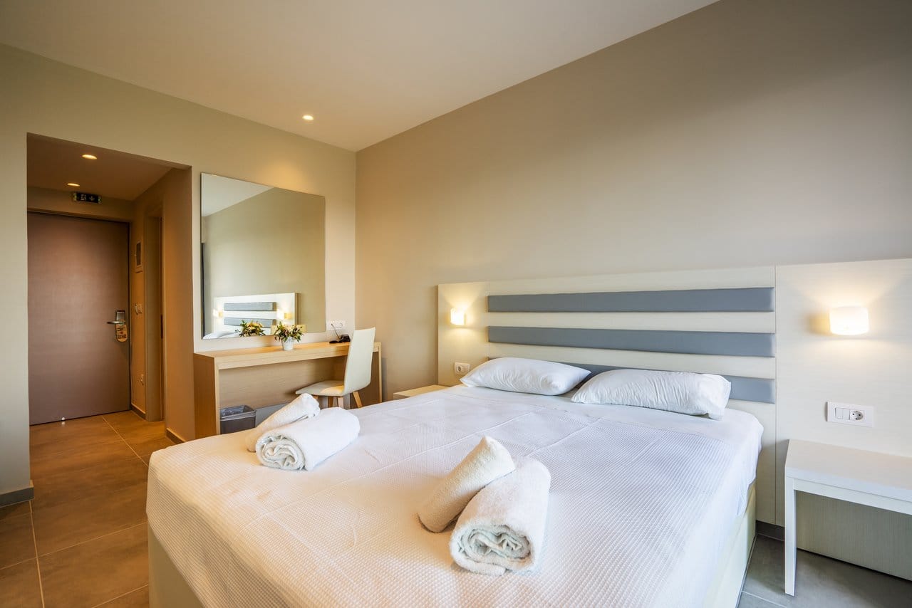 a bed with white pillows