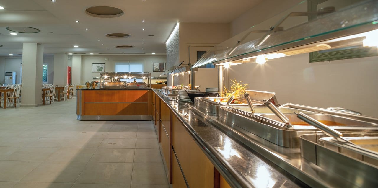 a large kitchen with stainless steel appliances