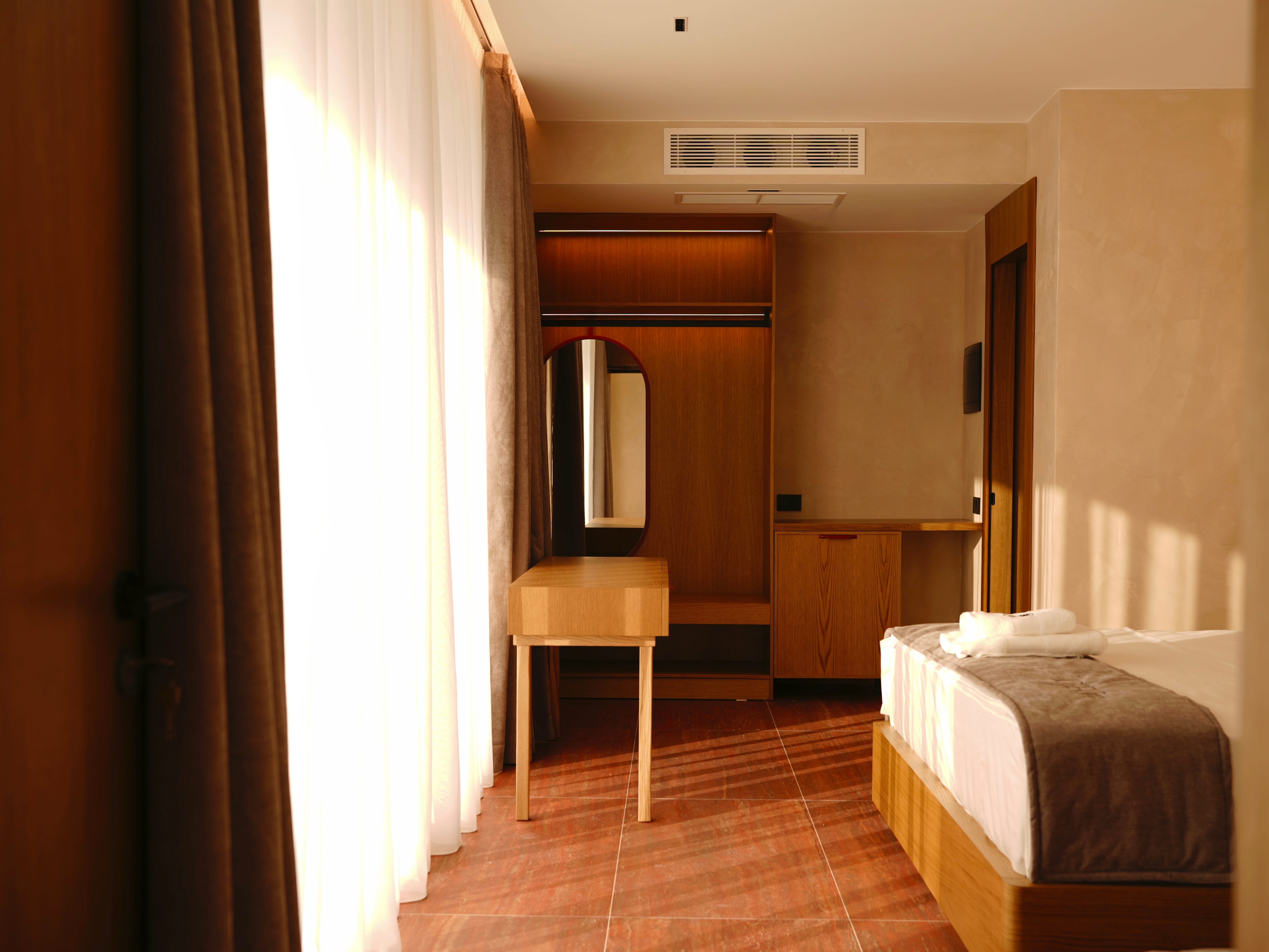 a room with a bed and a table