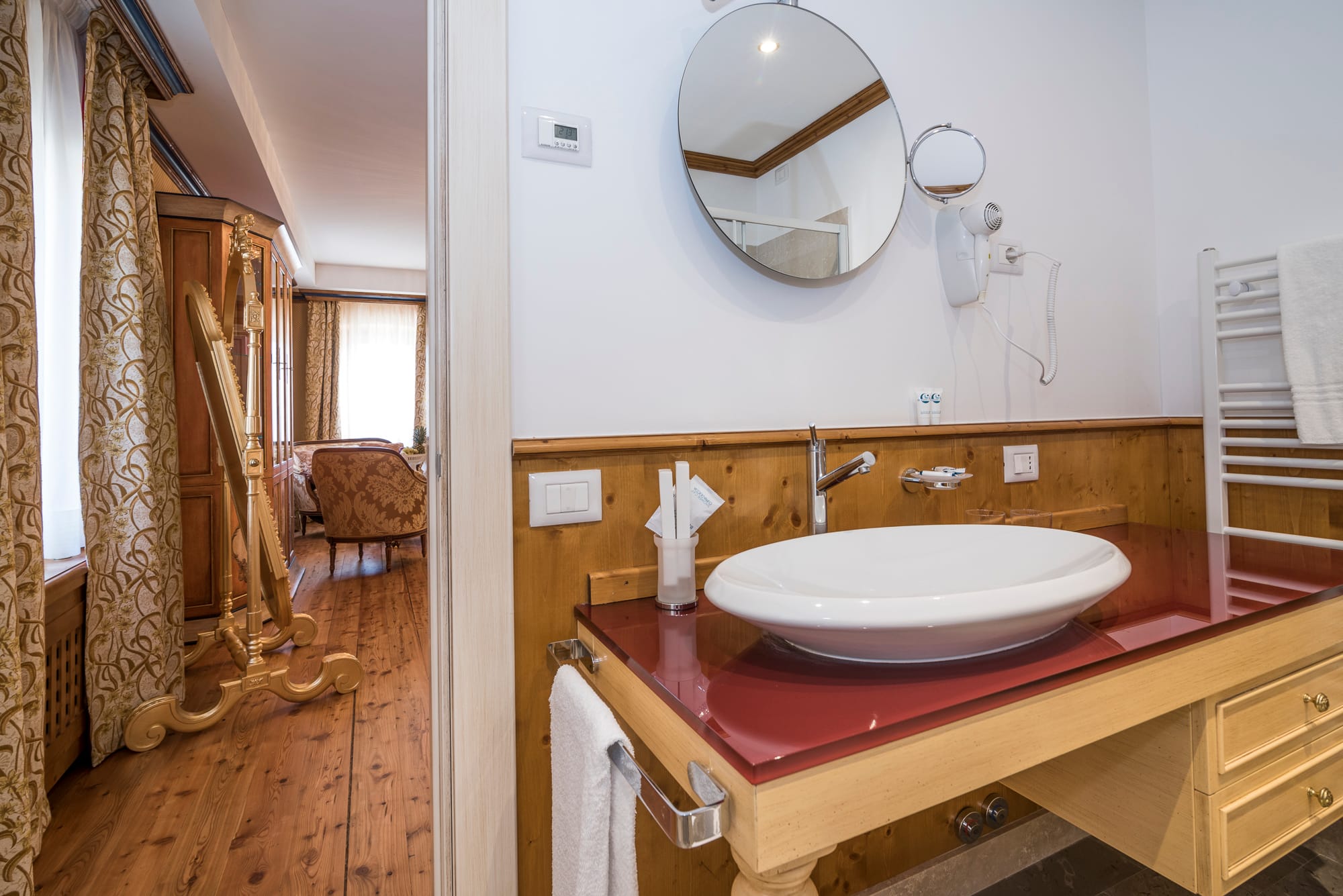 a bathroom with a large mirror