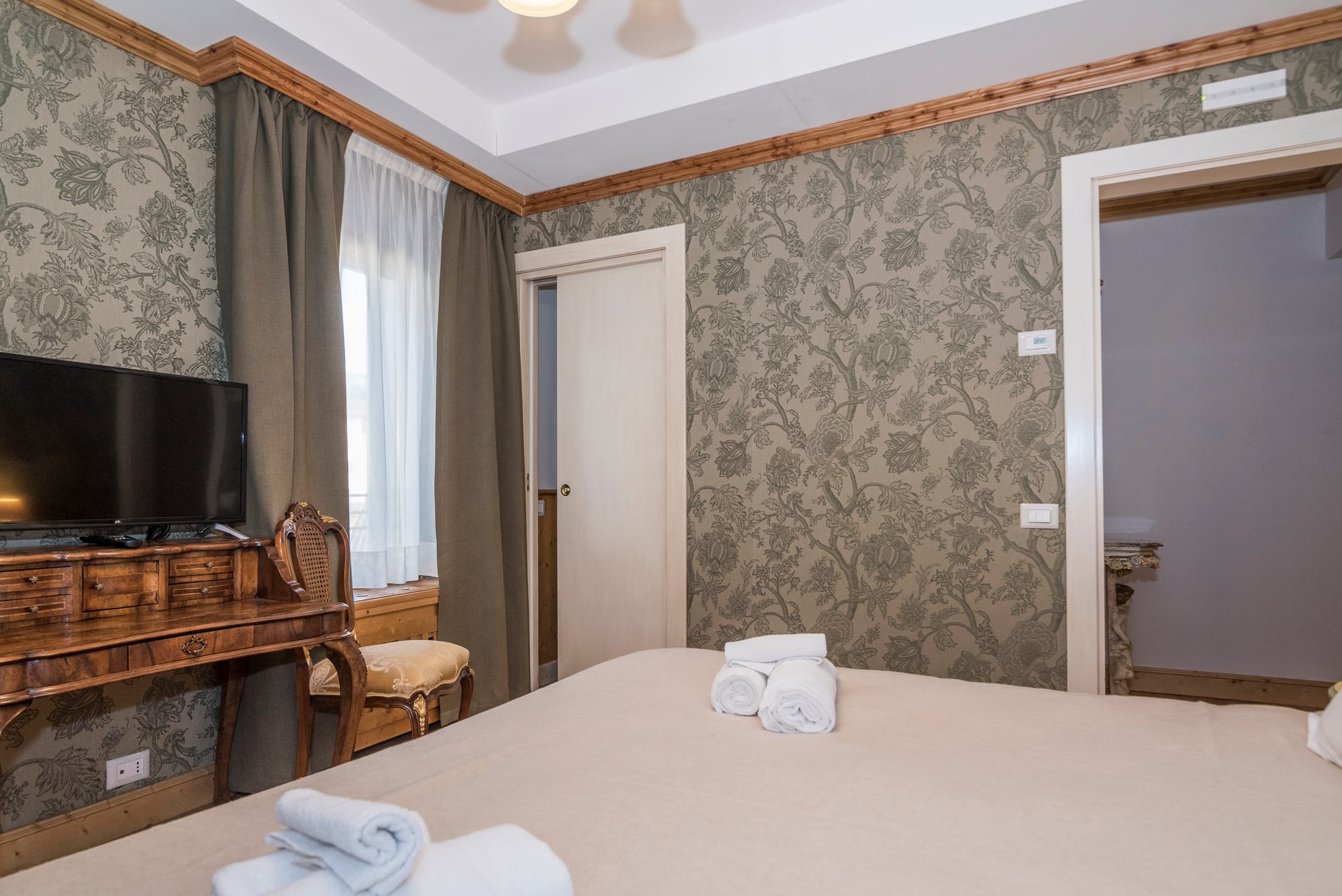 a bathroom with a large bed