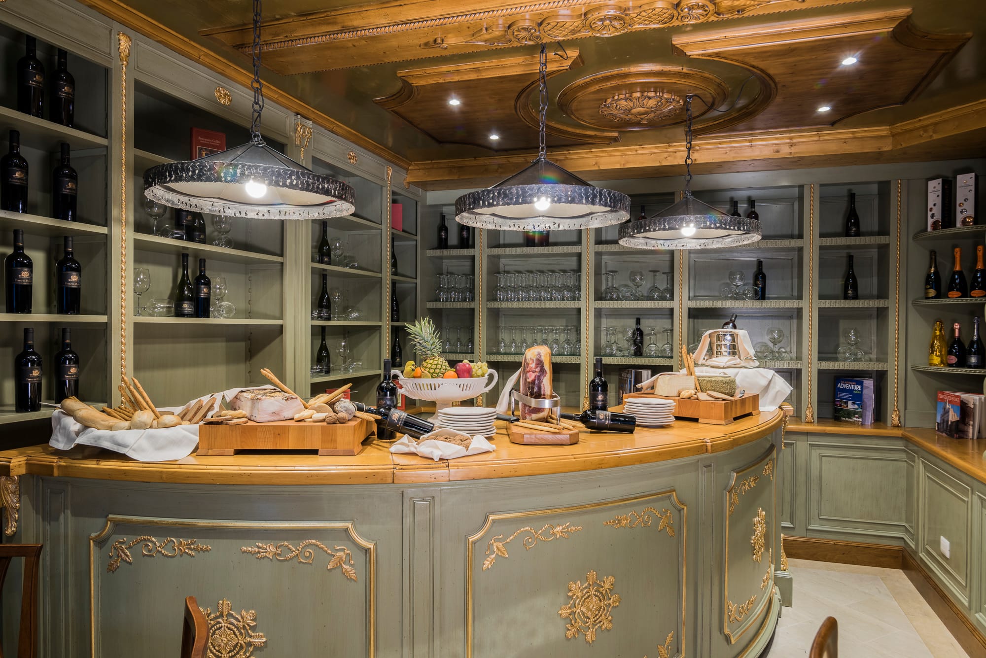 a person behind a counter in a kitchen
