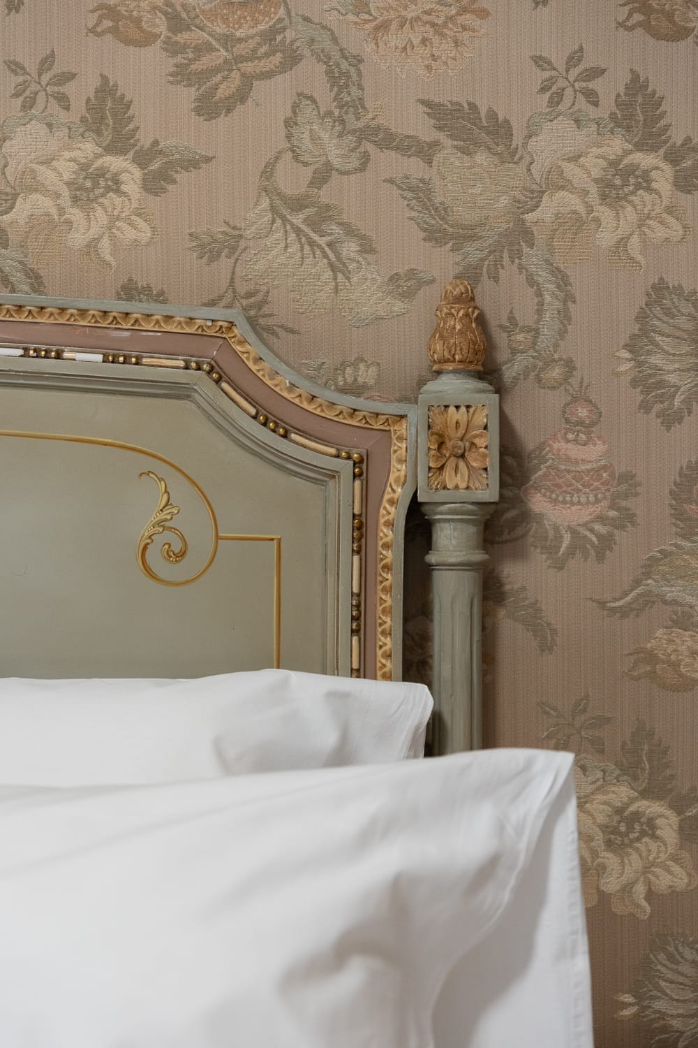 a bed with a white sheet