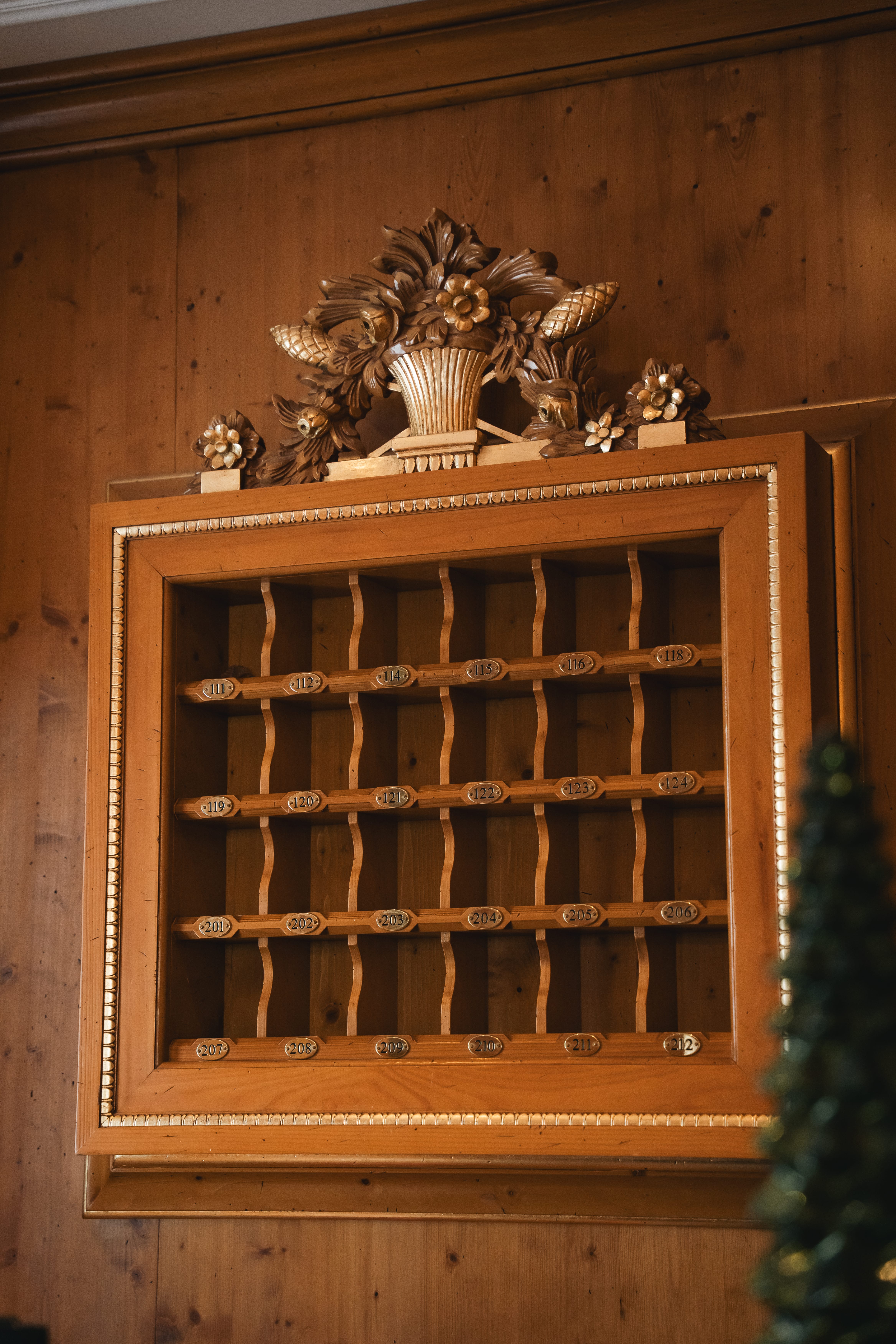 a wooden cabinet with shelves