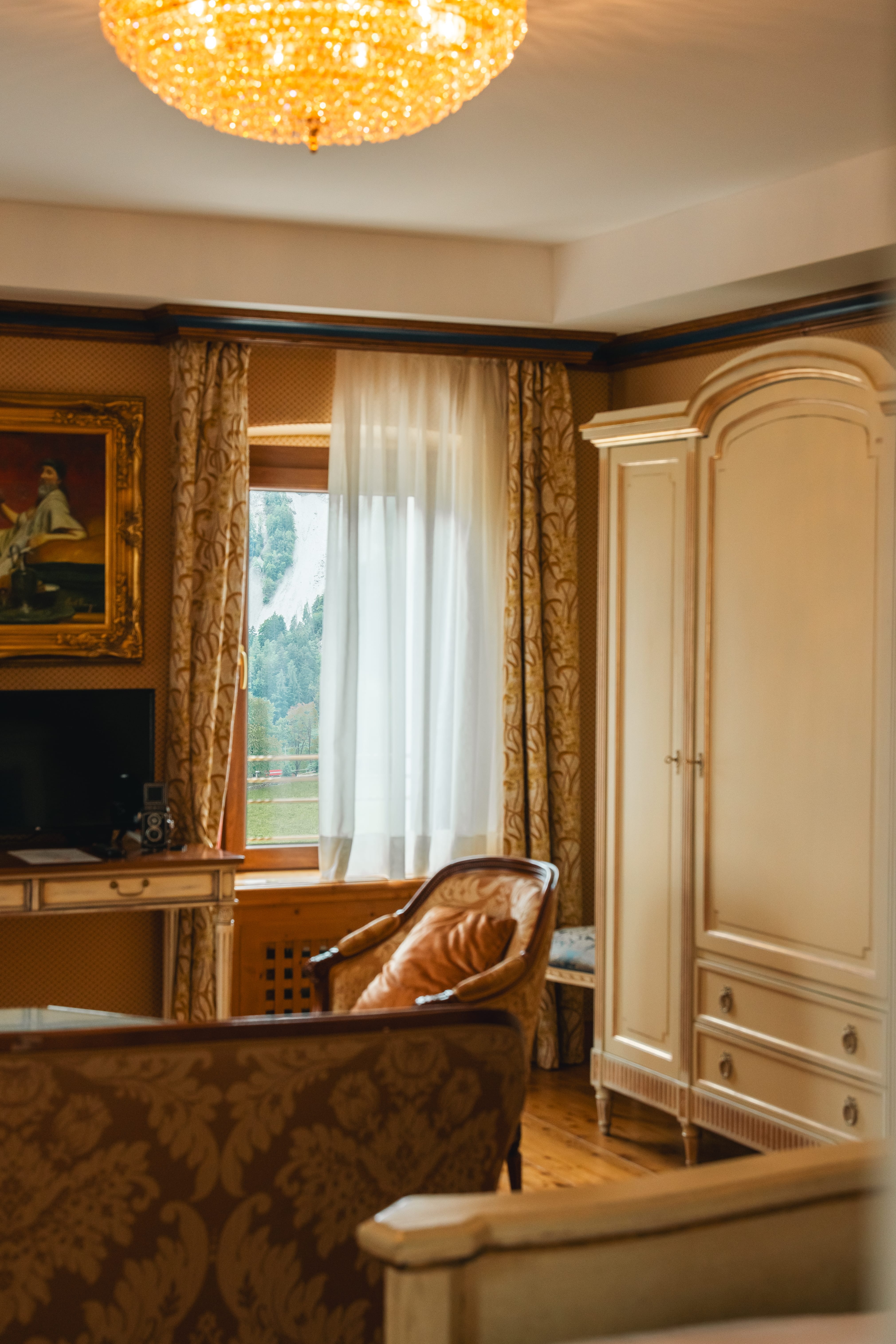 a room with a couch and a cabinet
