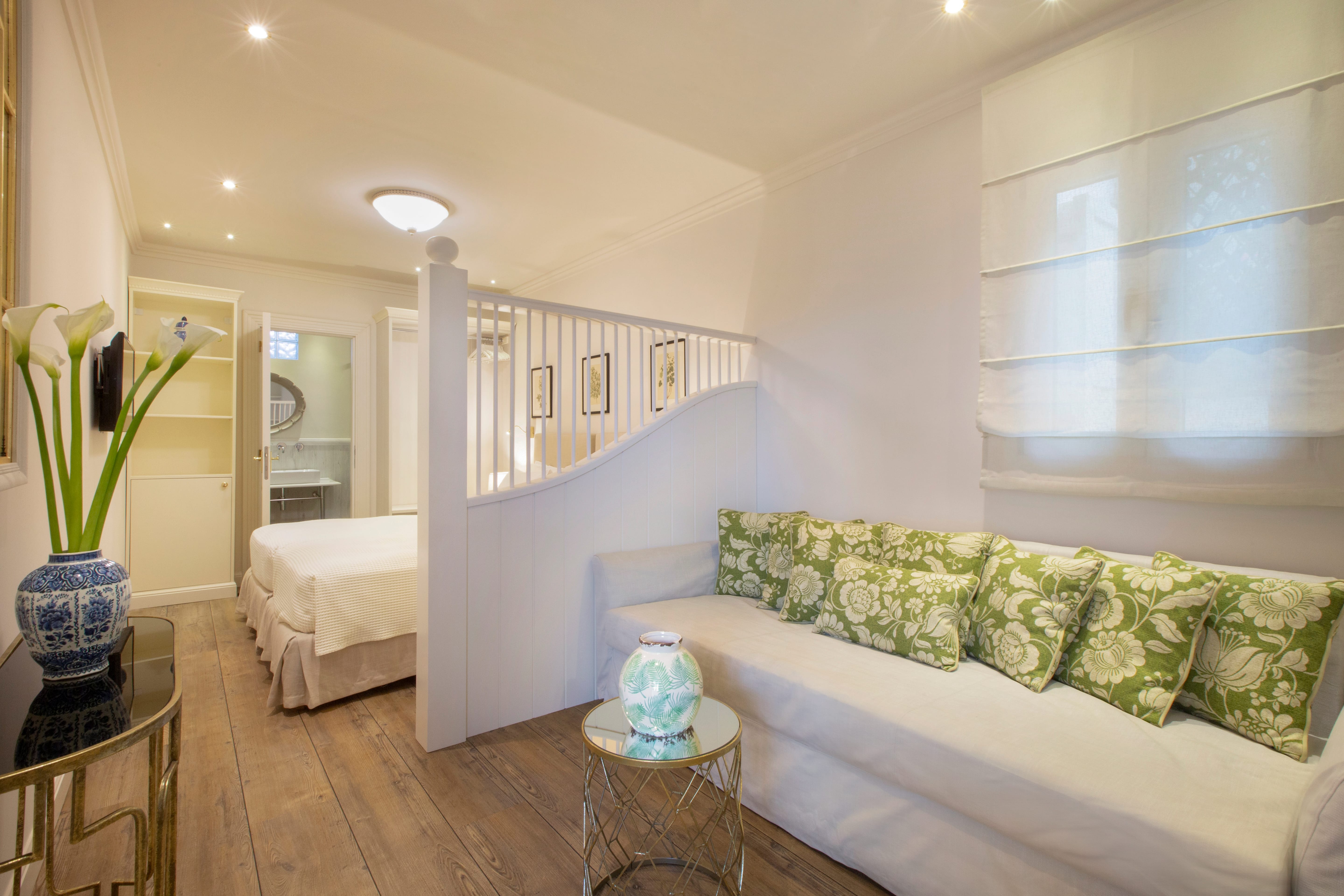 a room with a bed and a couch