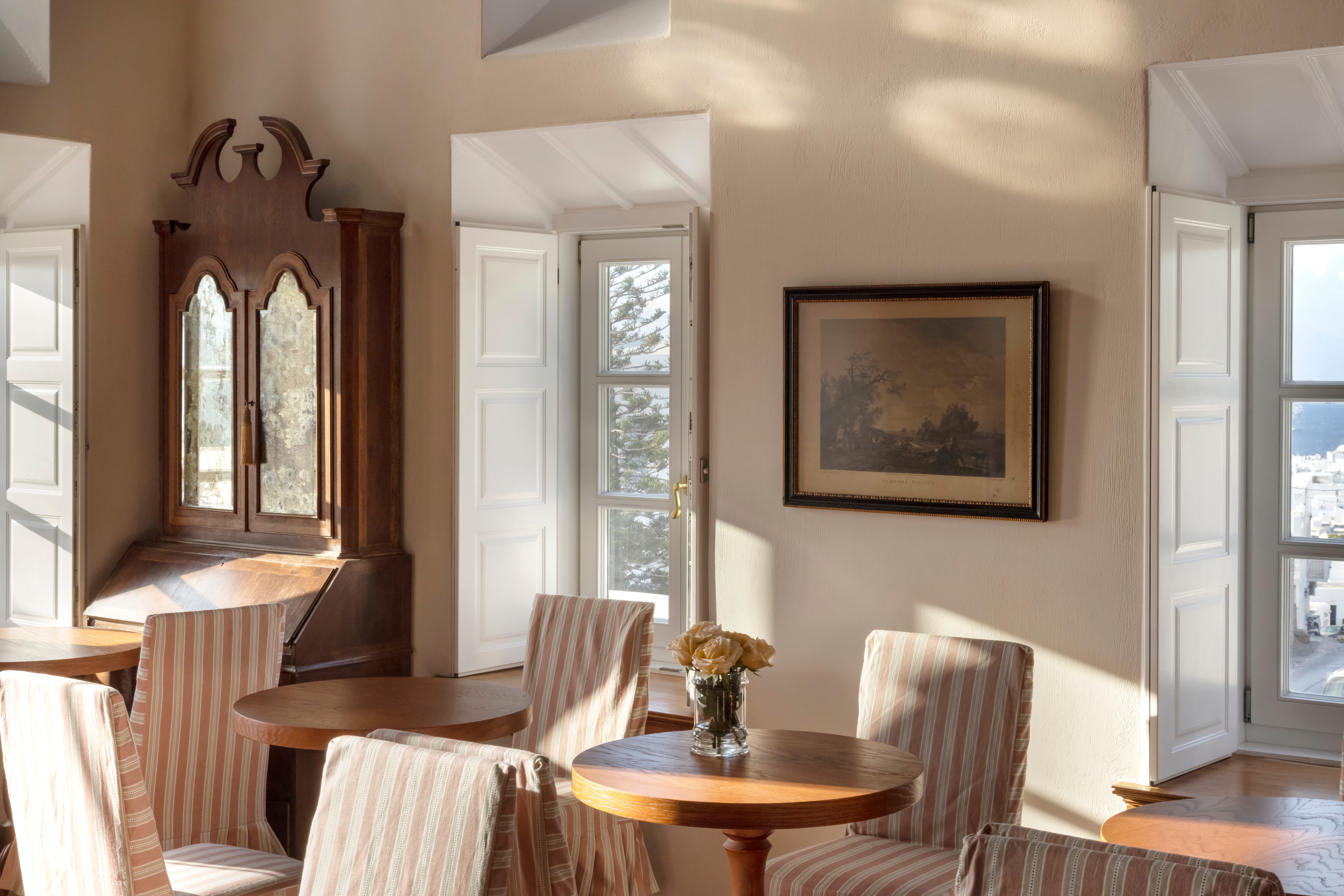 a room with a table and chairs