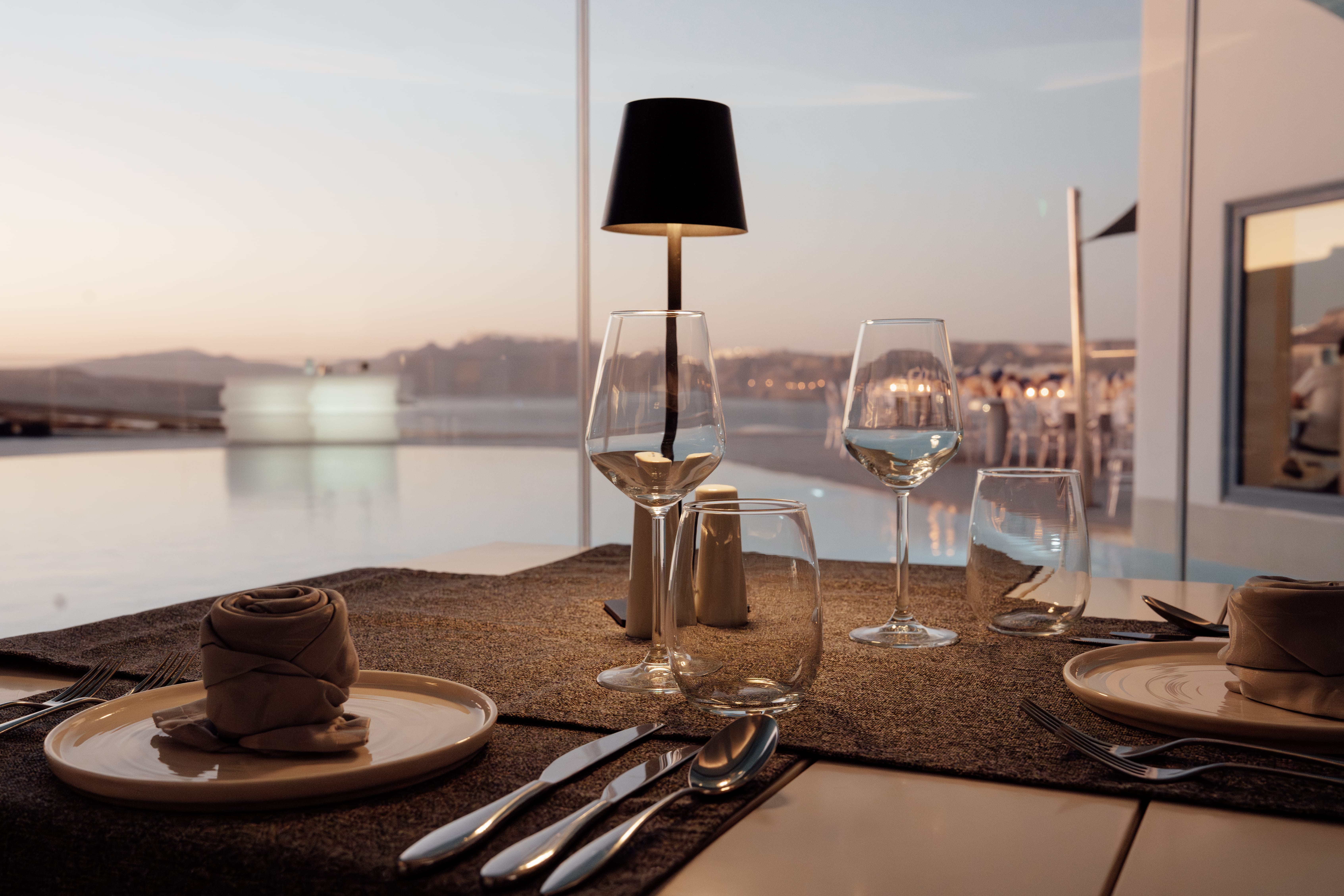 a table with plates and glasses