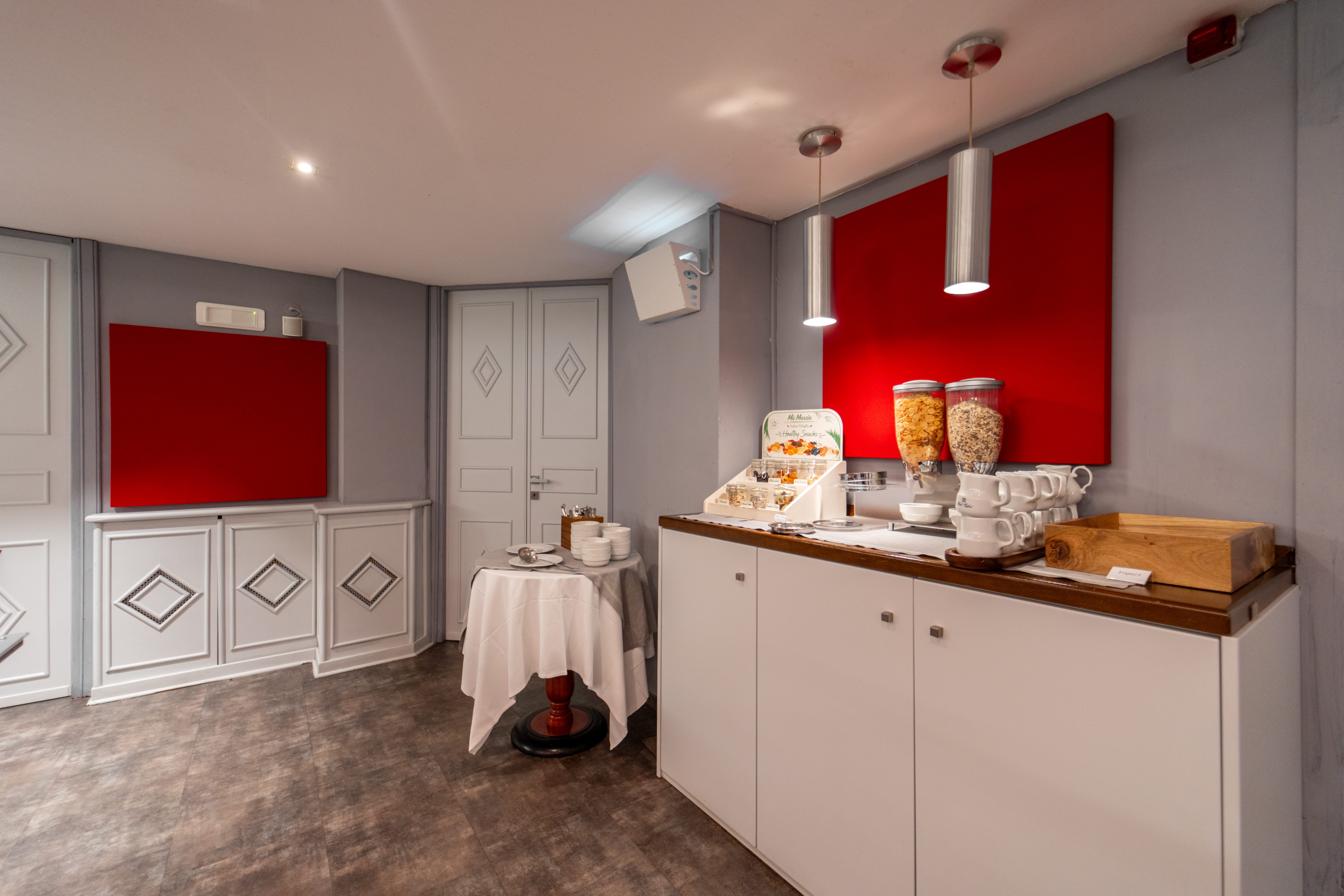 a kitchen with white cabinets