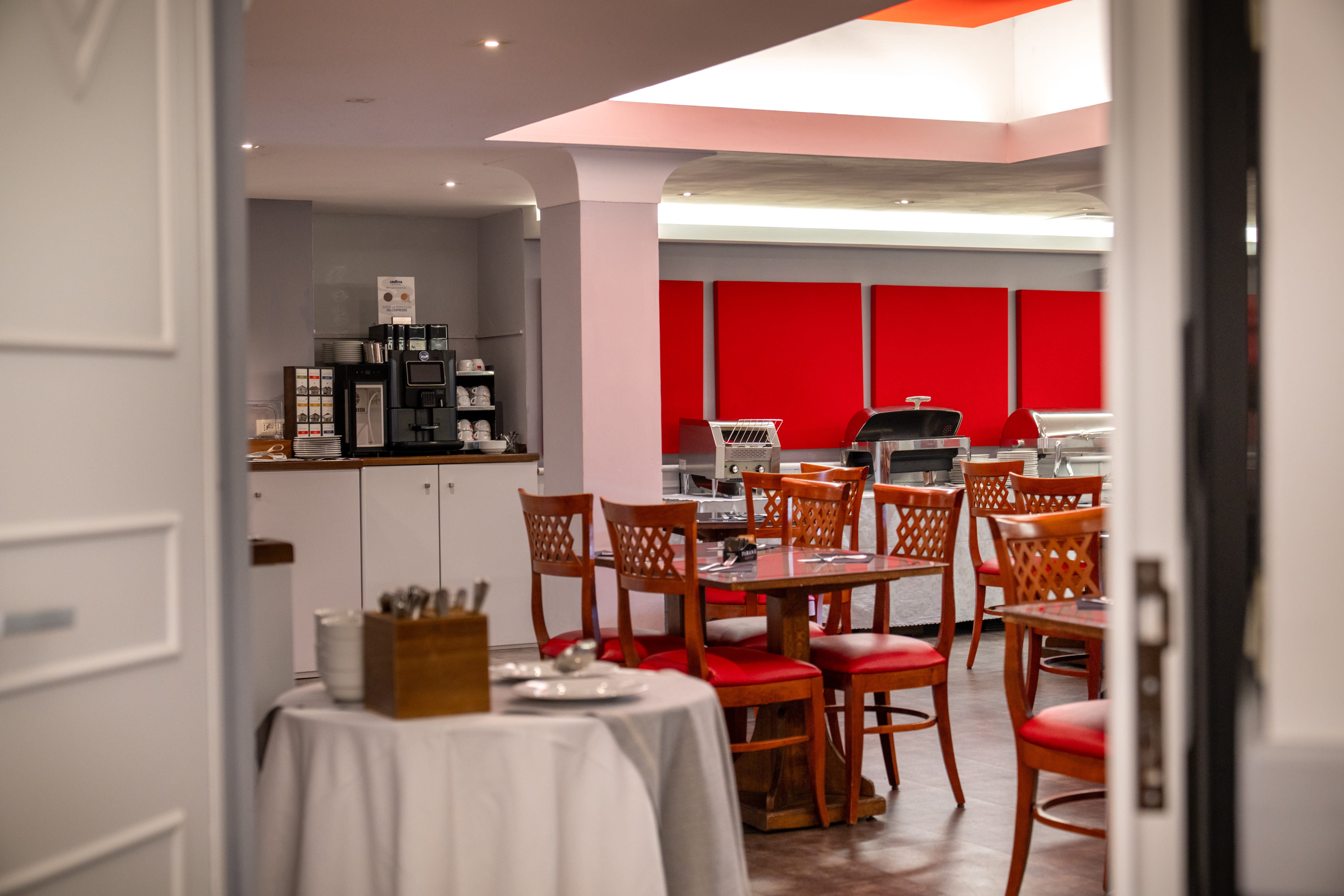 a room with a table and chairs