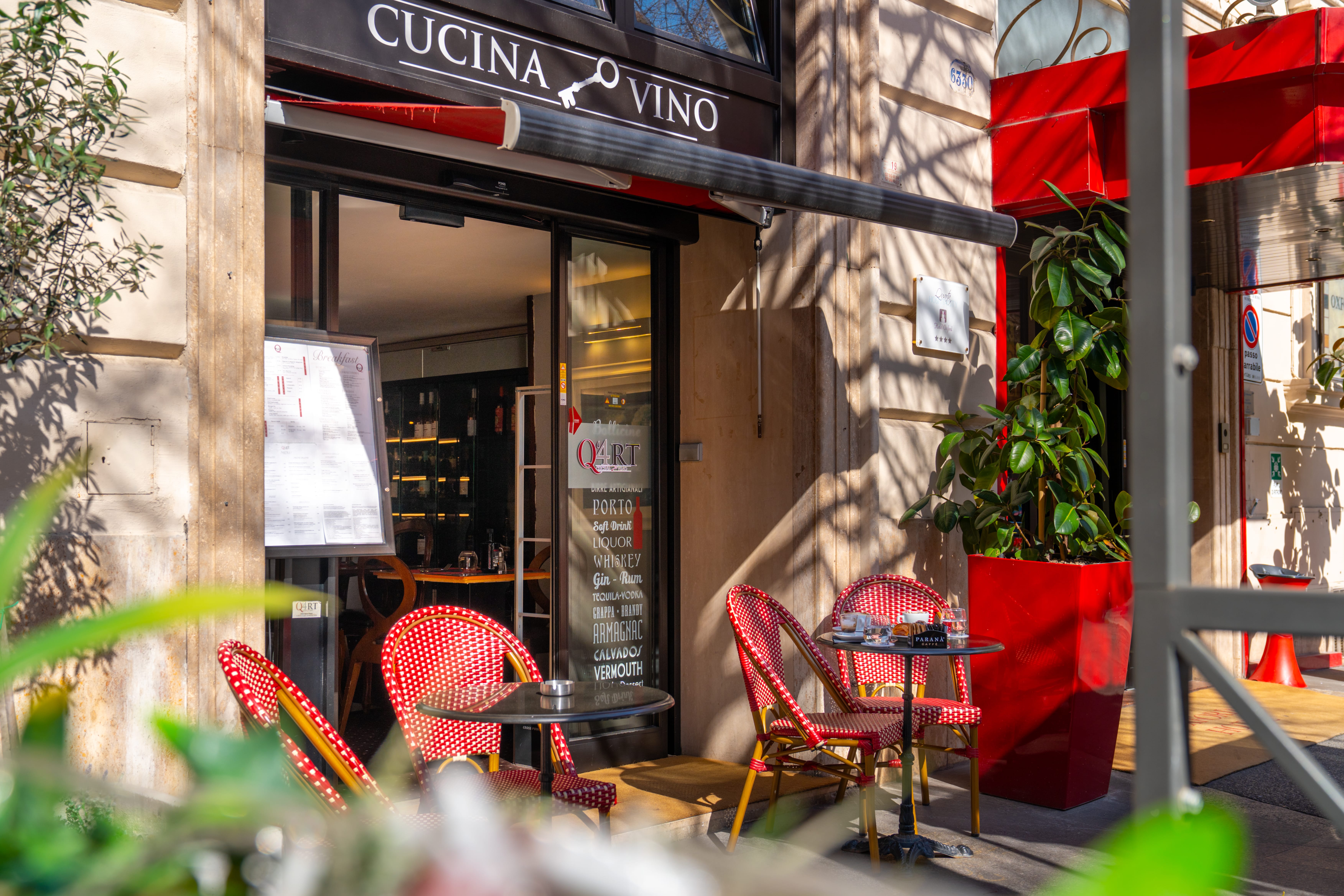a restaurant with red chairs