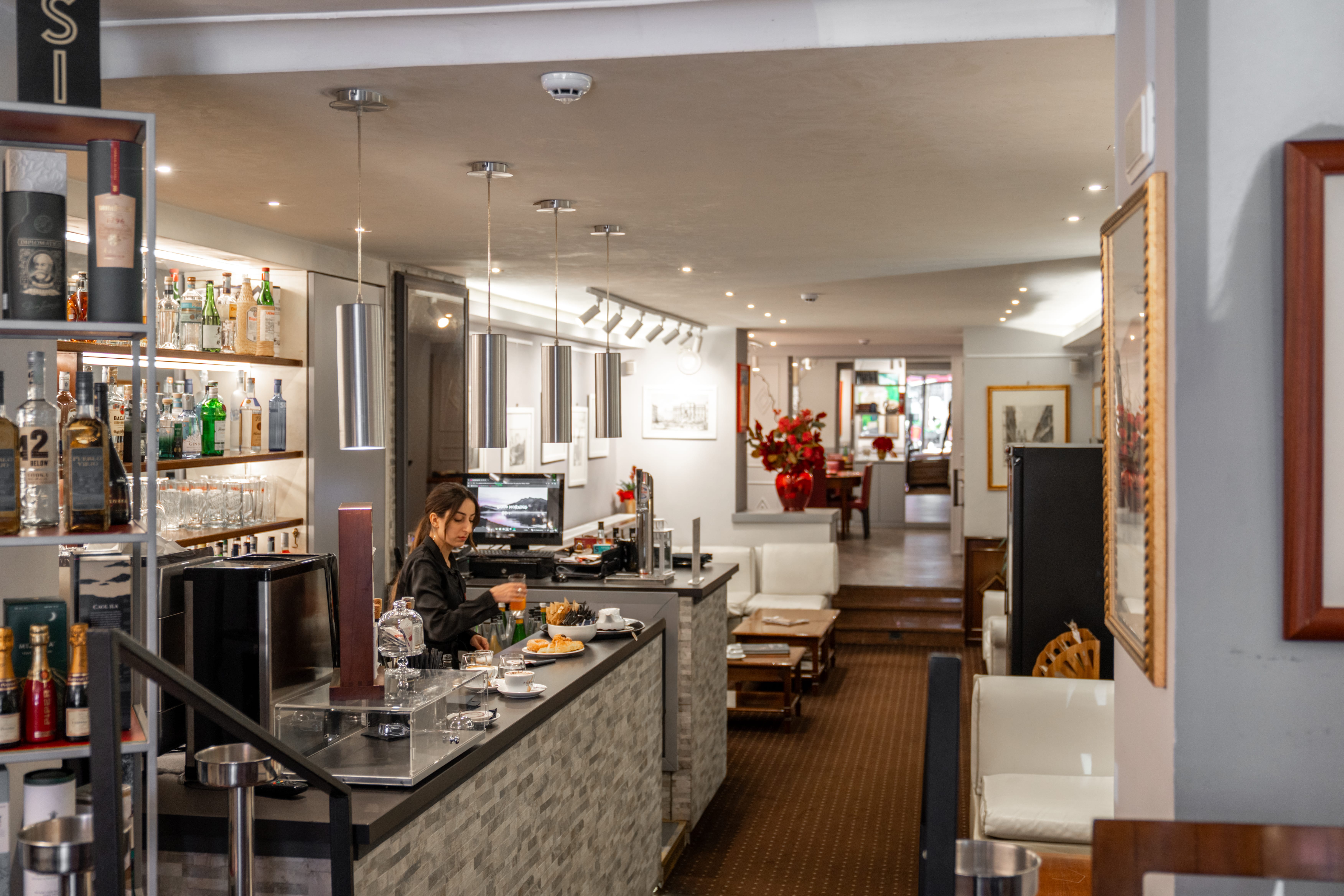 a person sitting at a bar