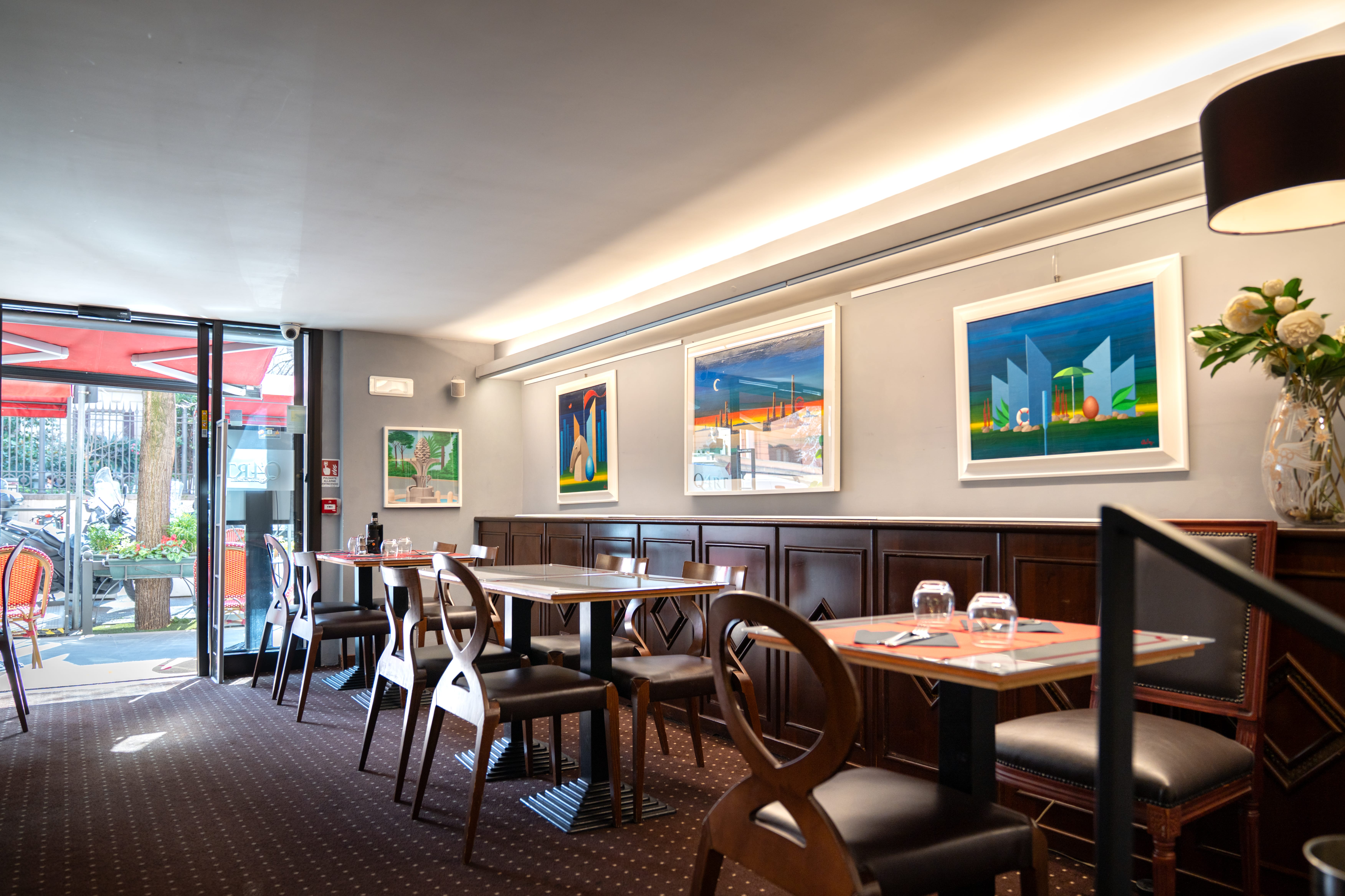 a room with tables and chairs