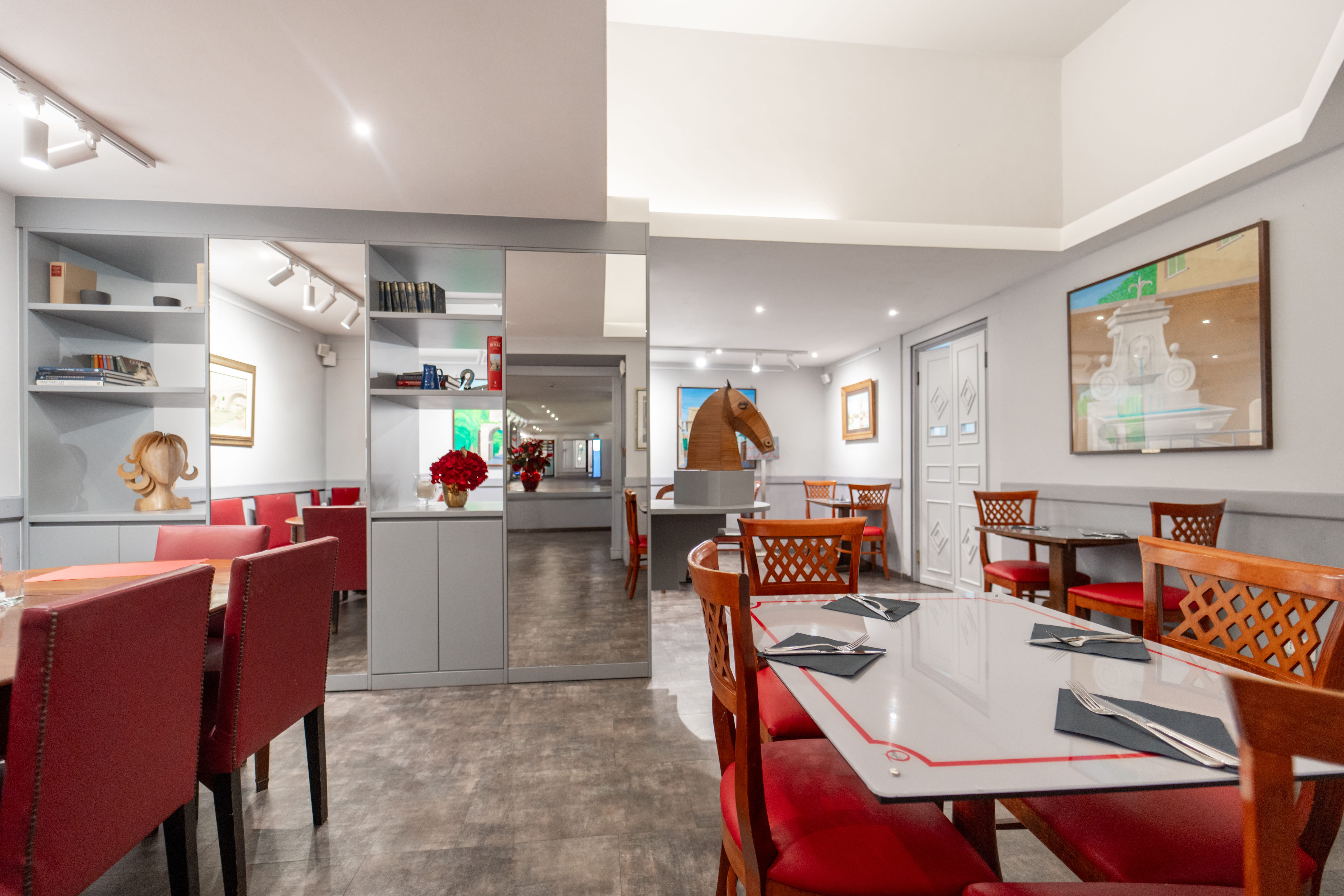 a room with tables and chairs