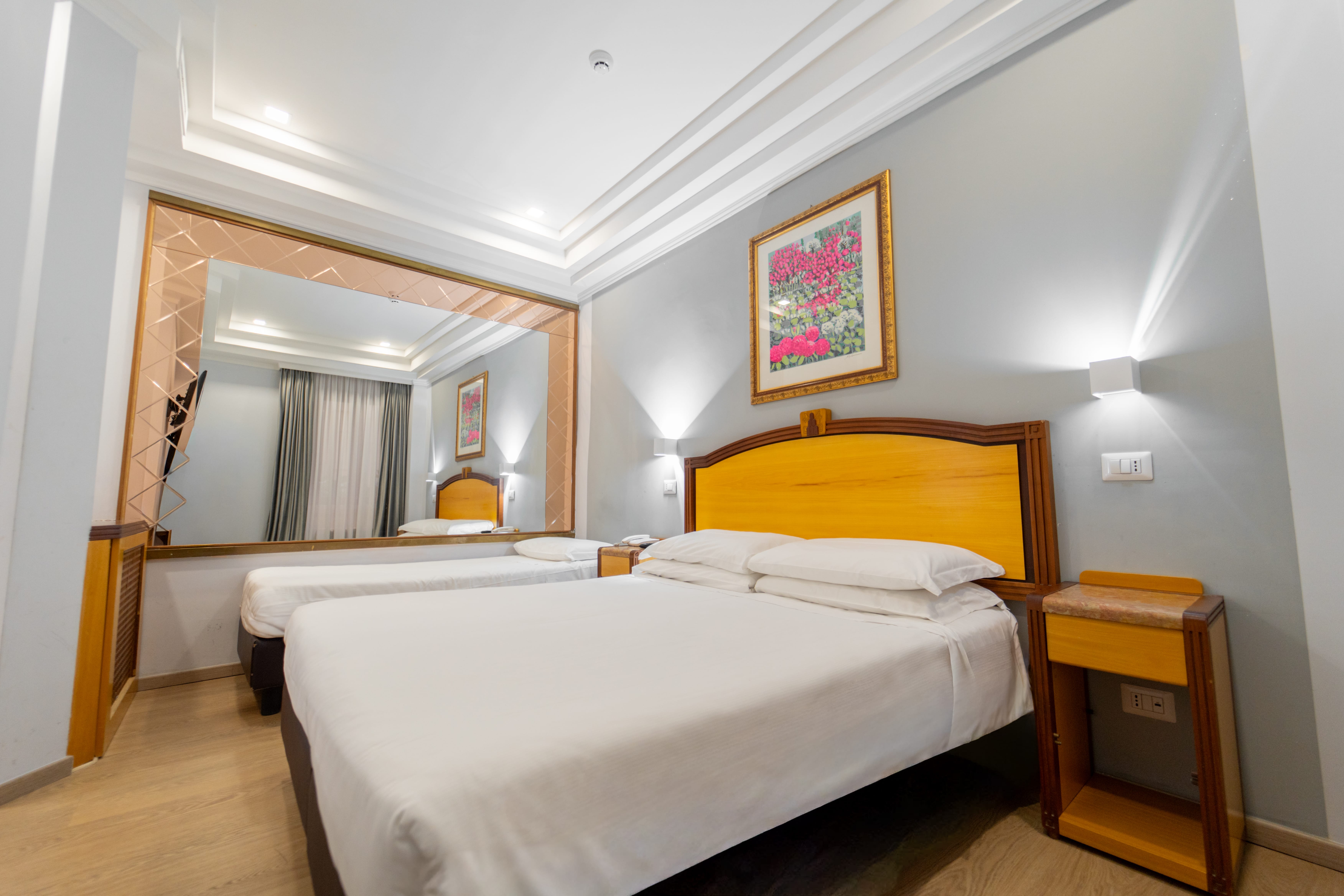 a bedroom with two beds