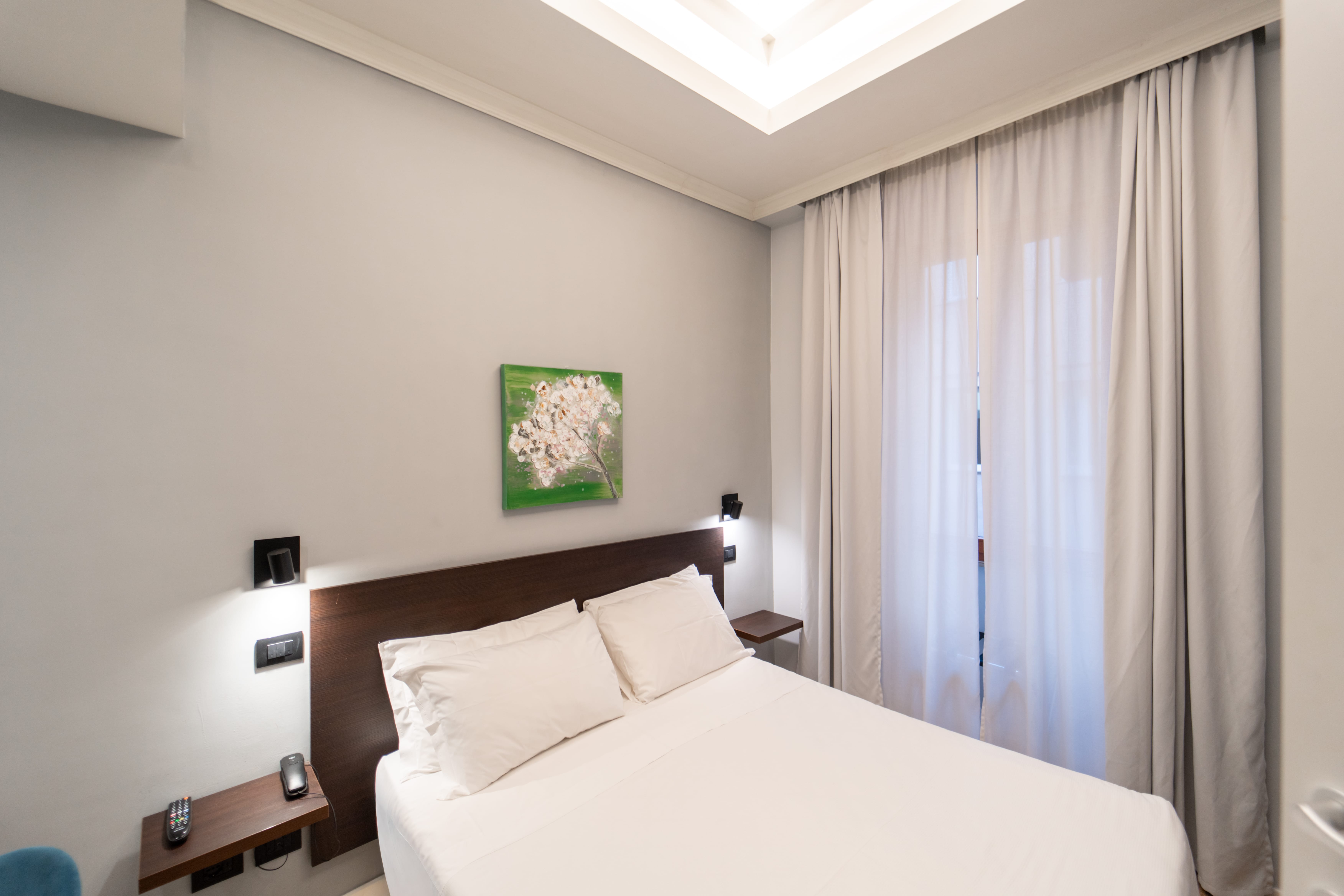 a bed with a white sheet