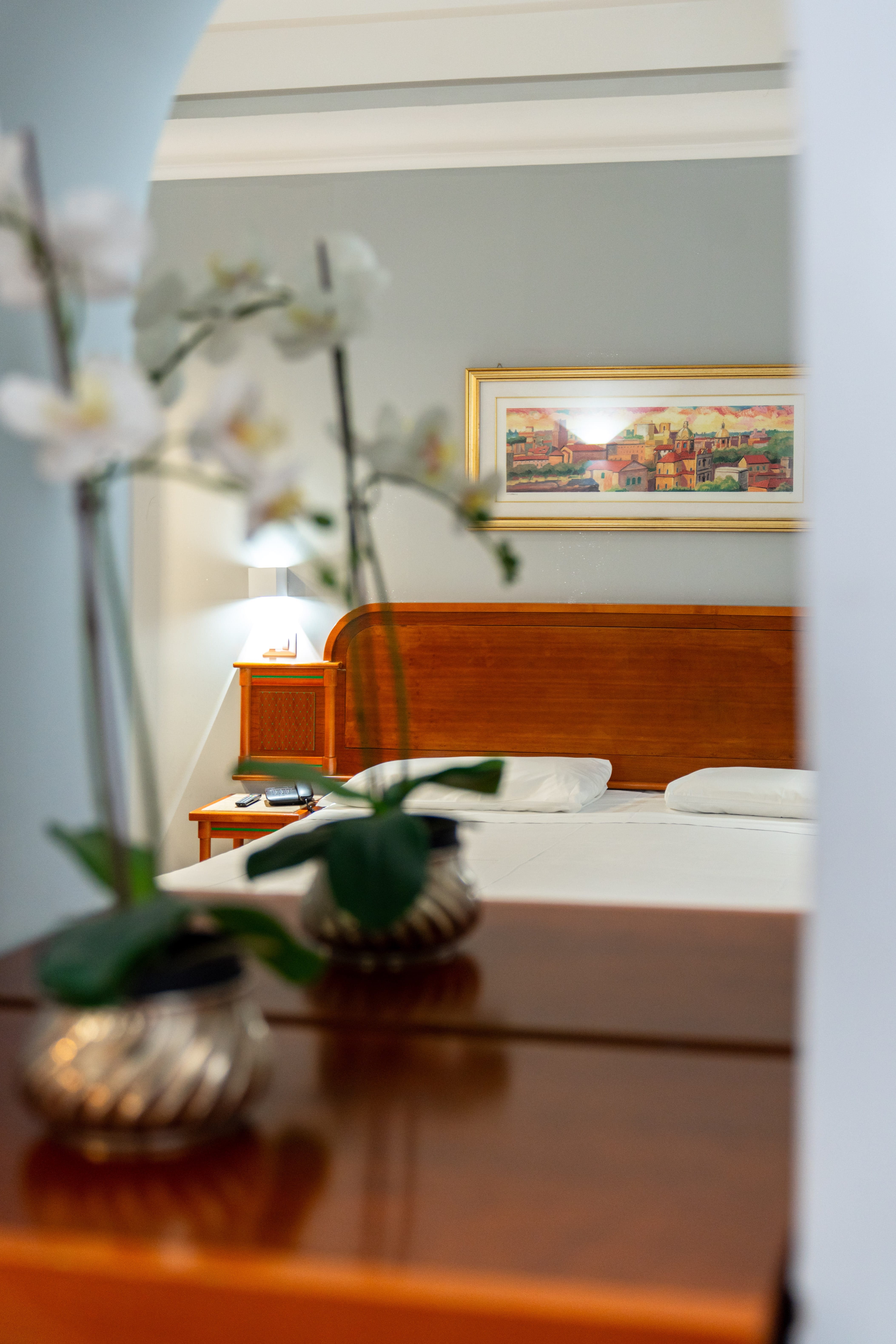 a vase with white flowers