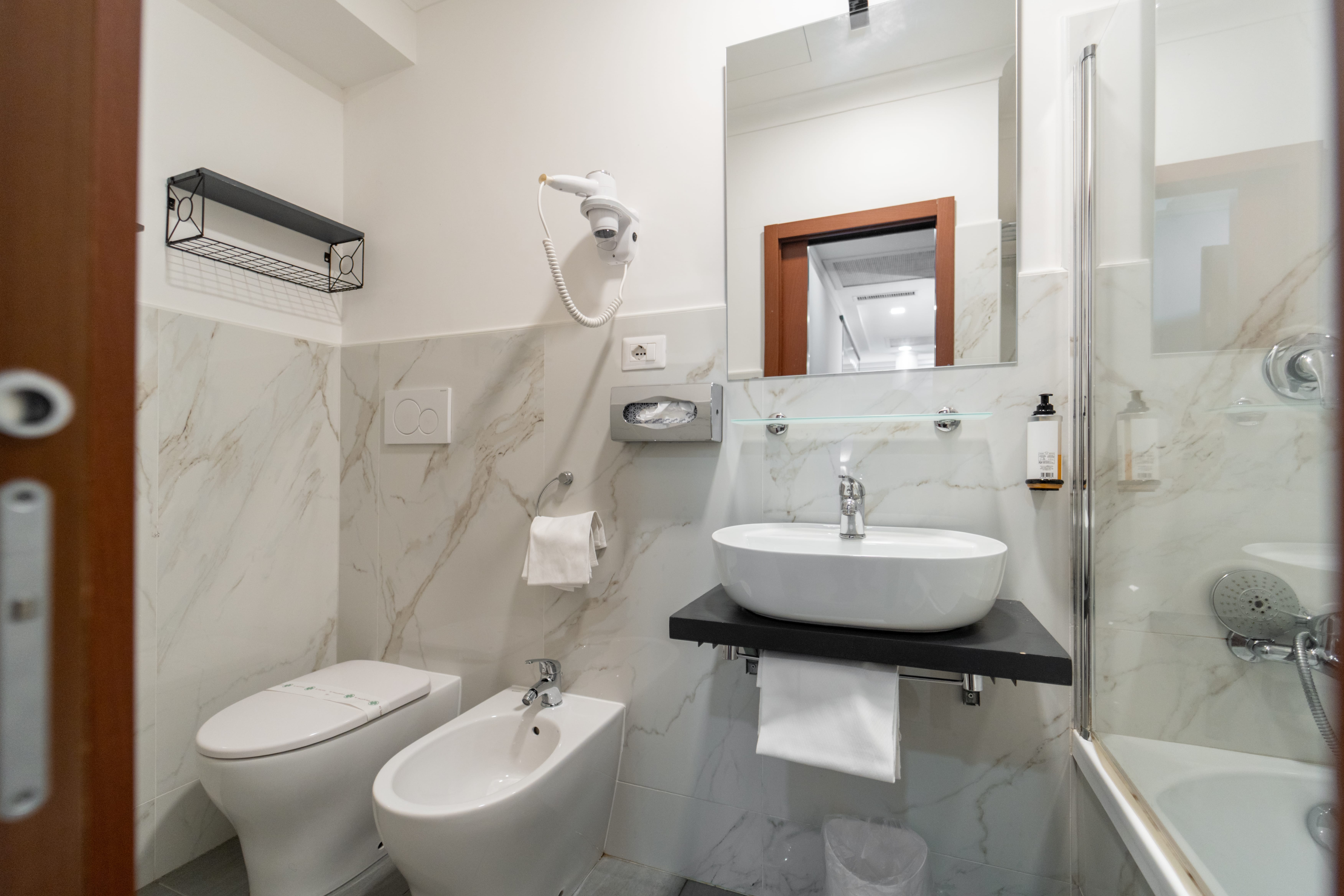 a bathroom with a sink and a toilet