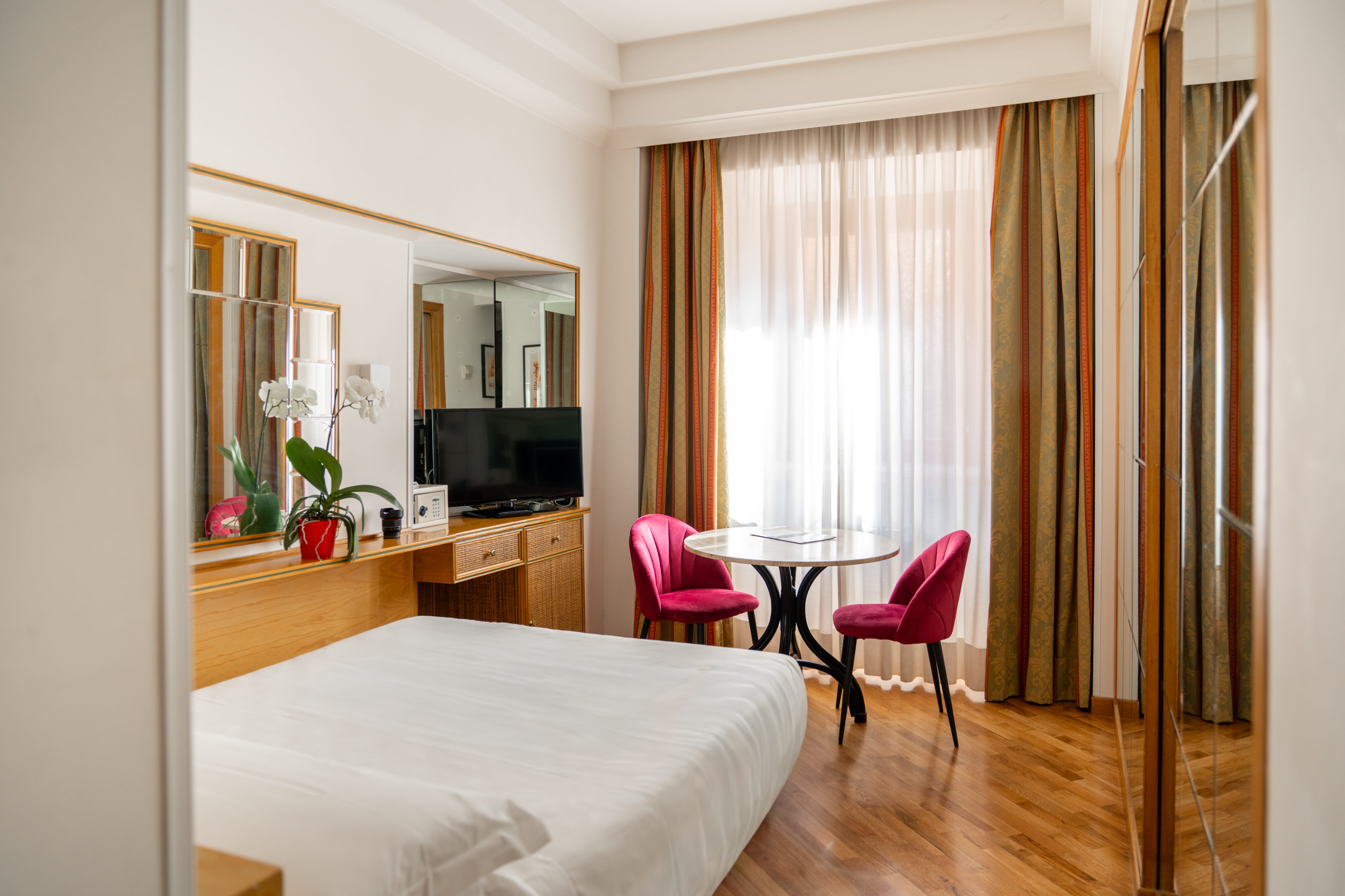 a room with a bed and a table