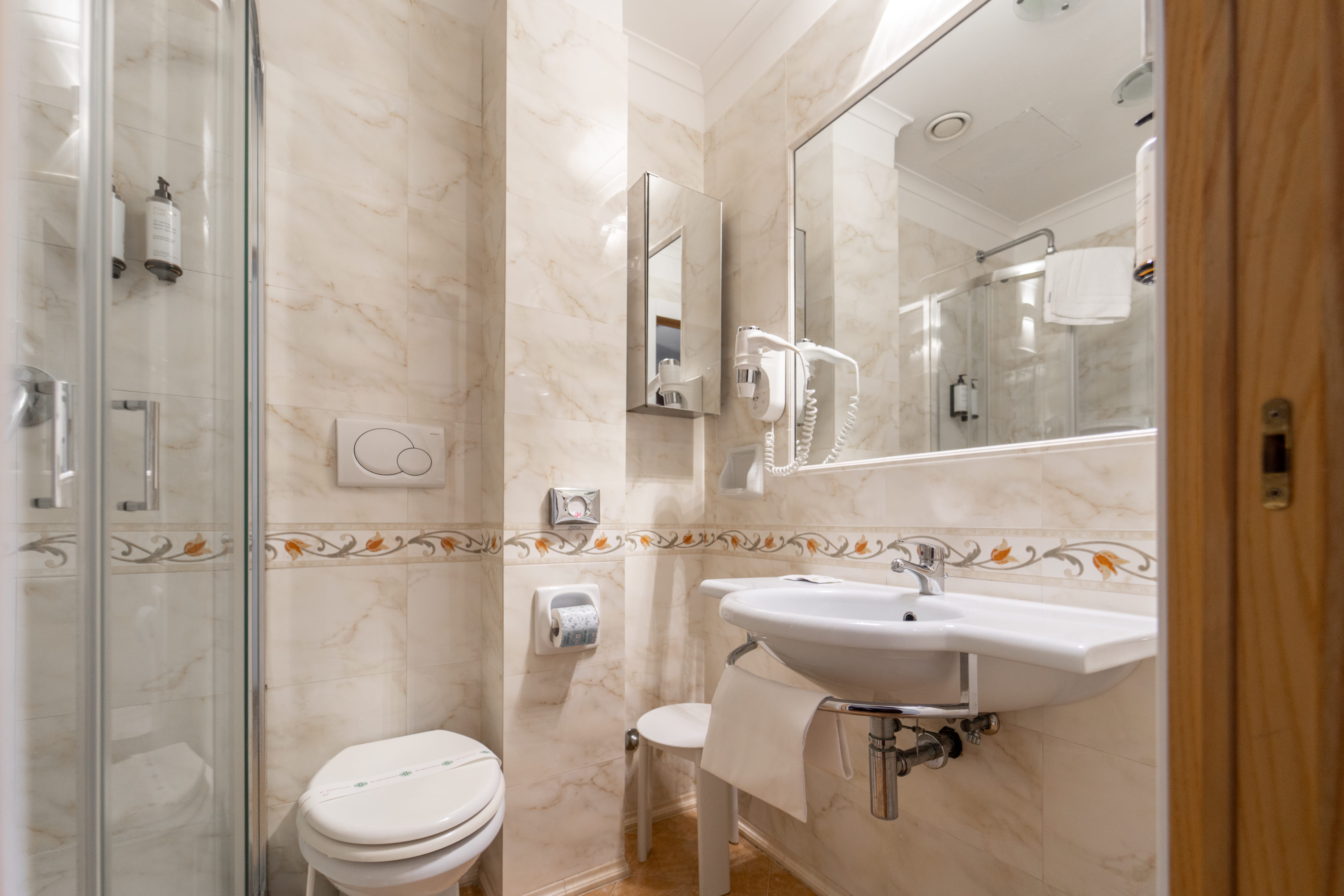 a bathroom with a glass shower