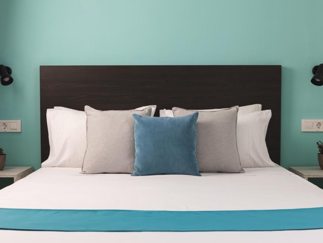 a bed with pillows
