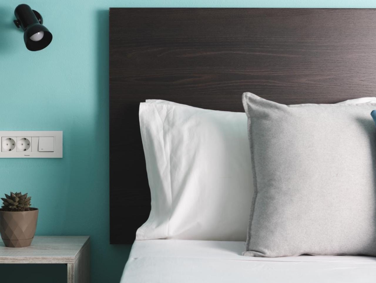 a bed with white pillows