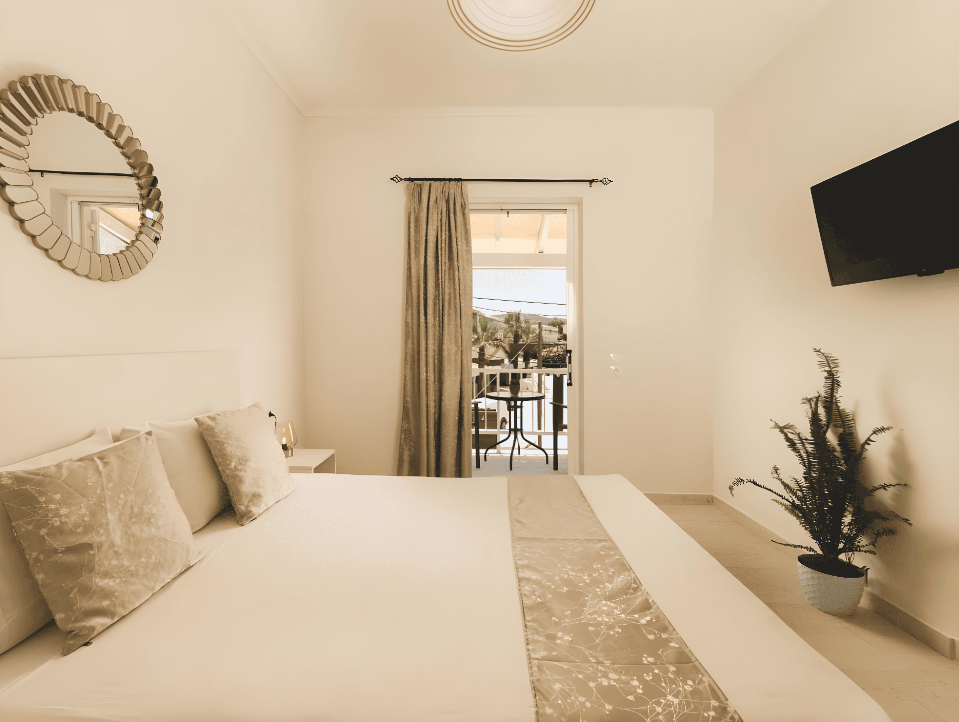 a bedroom with a large mirror