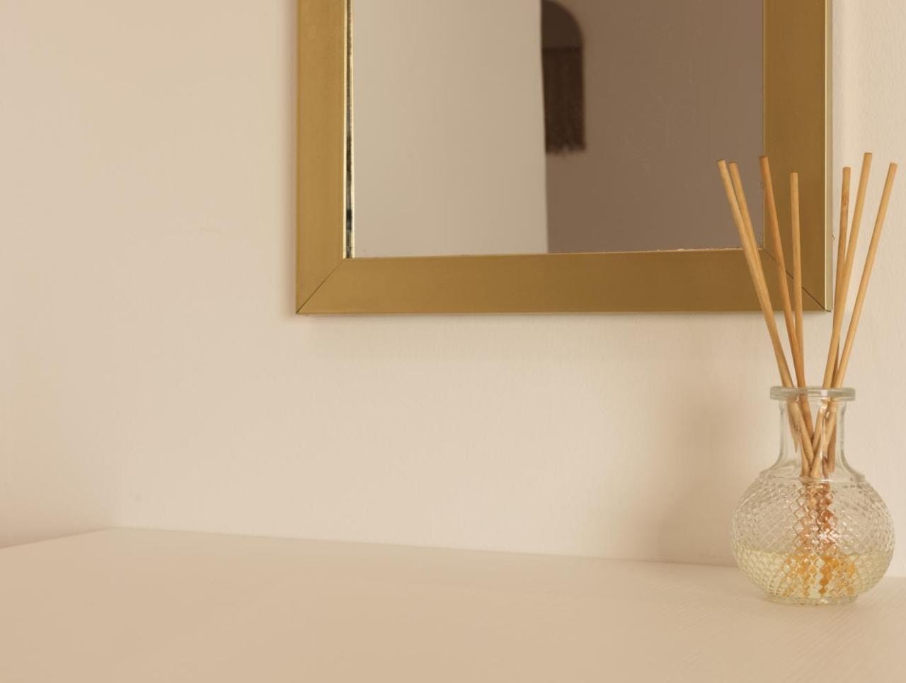 a vase with straws