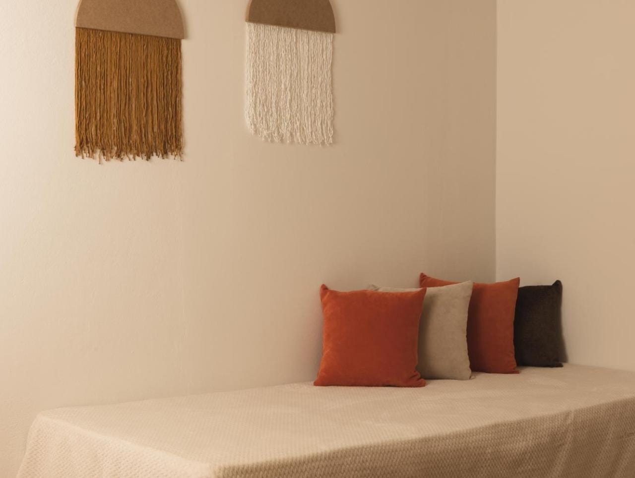 a bed with pillows