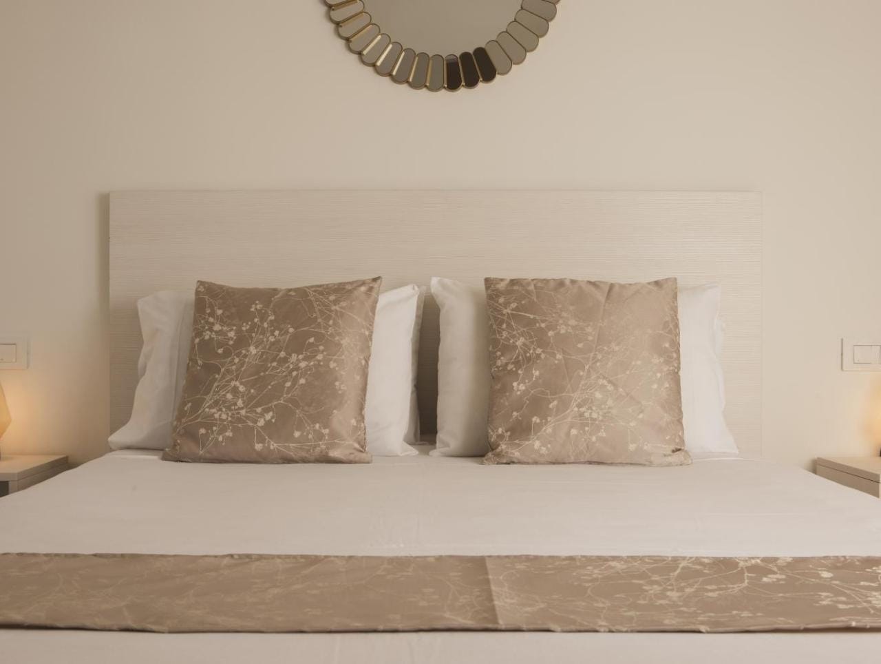 a bed with pillows