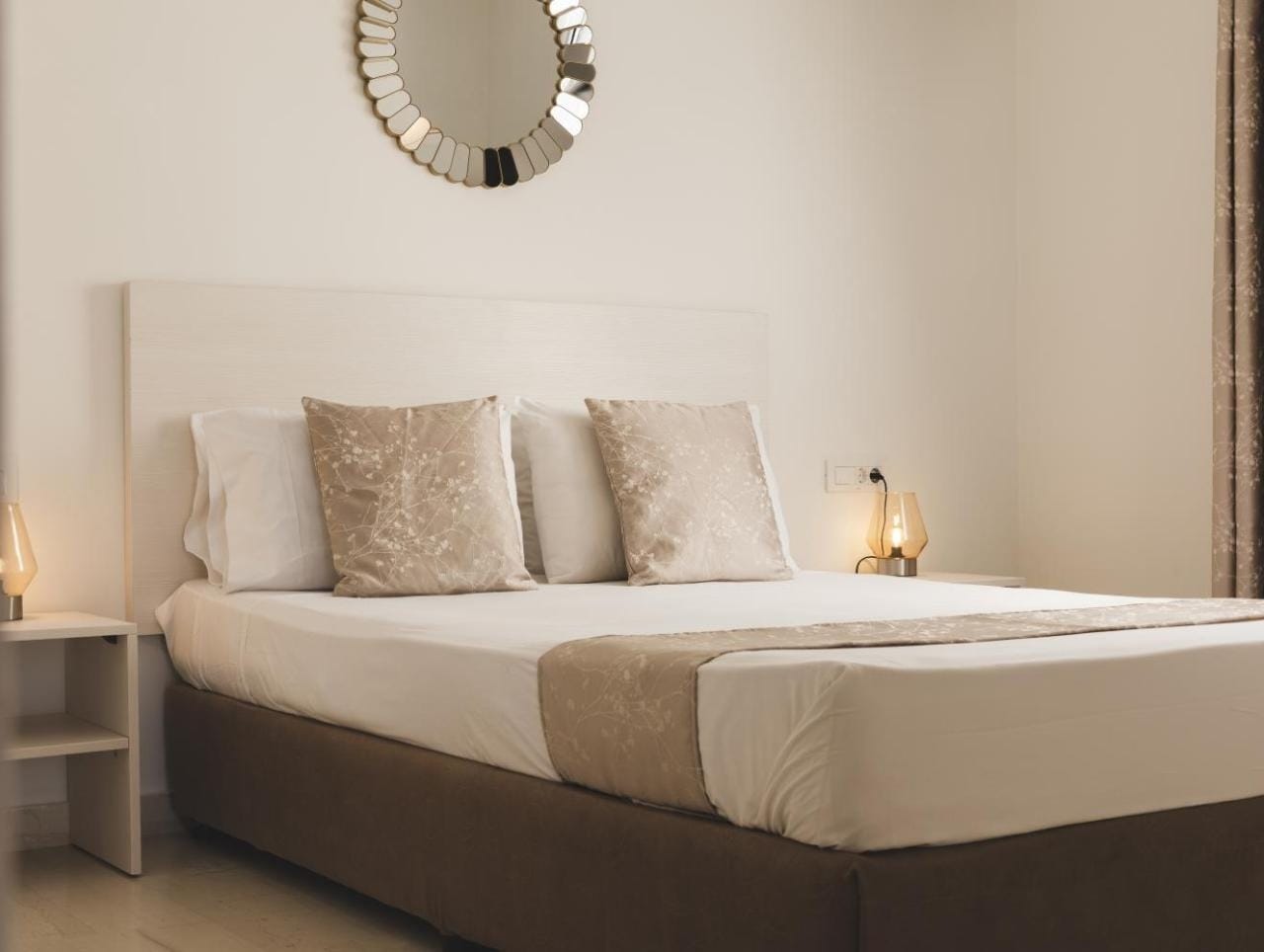 a bed with white pillows