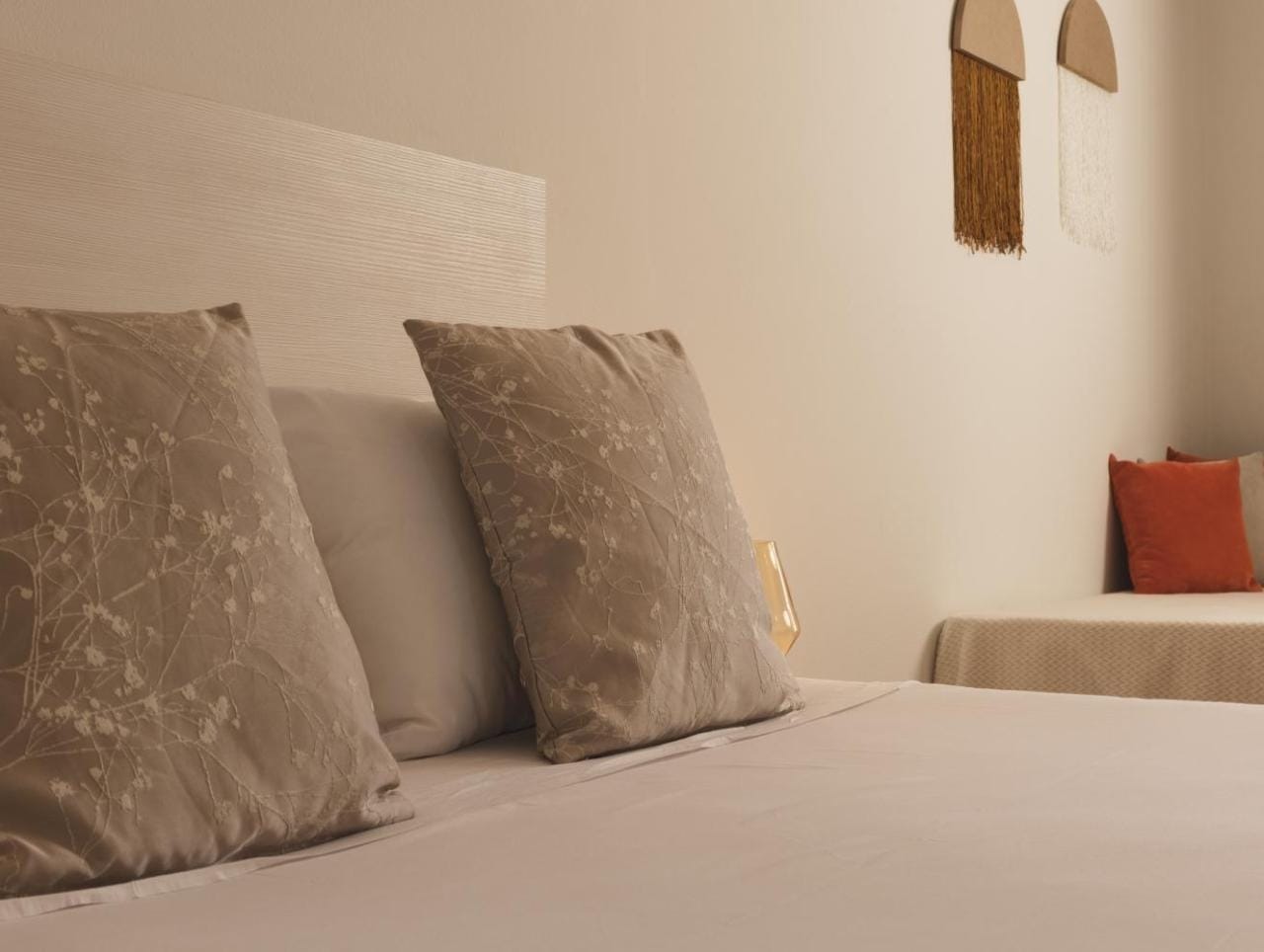 a bed with pillows