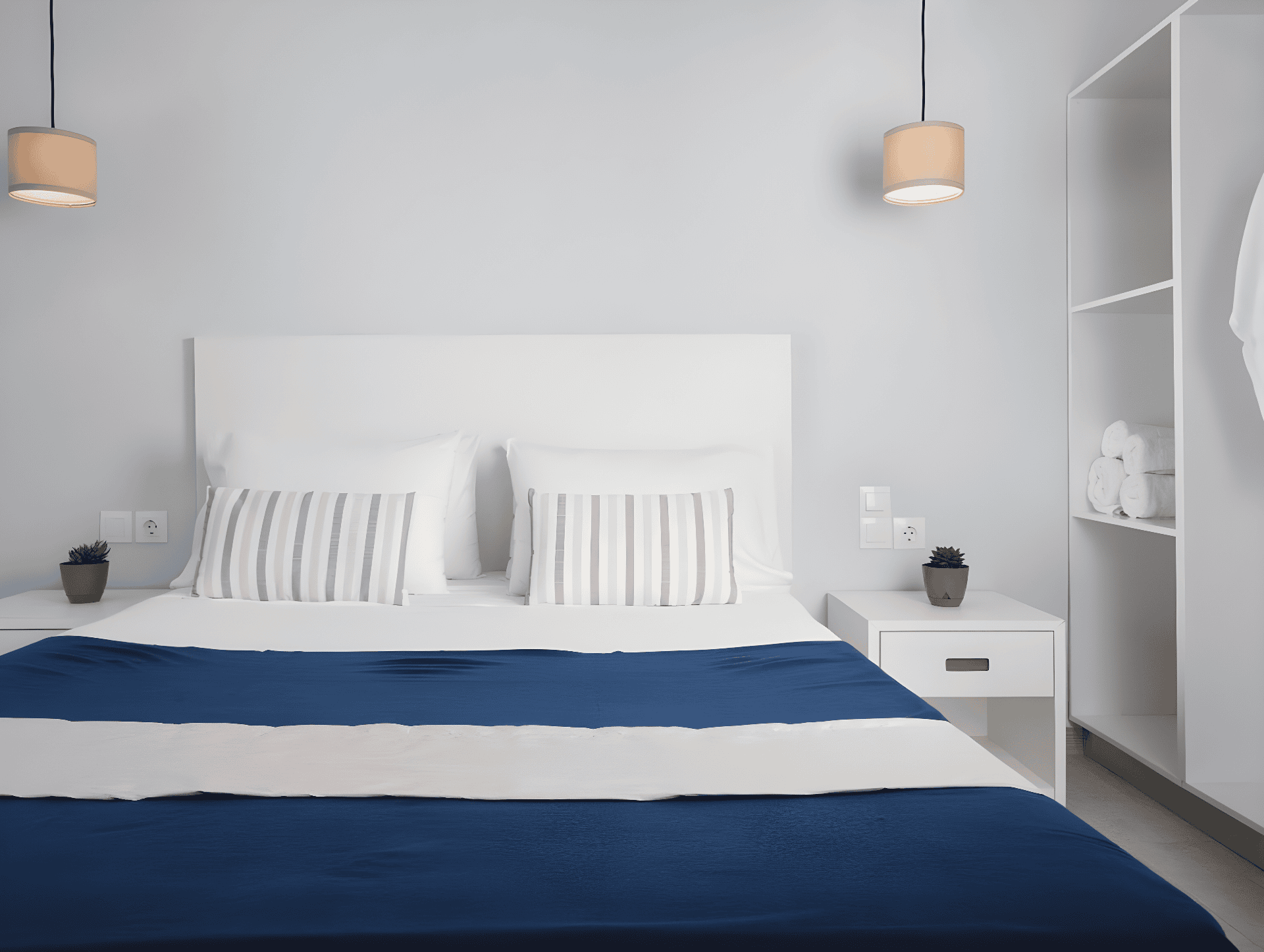 a bed with white sheets