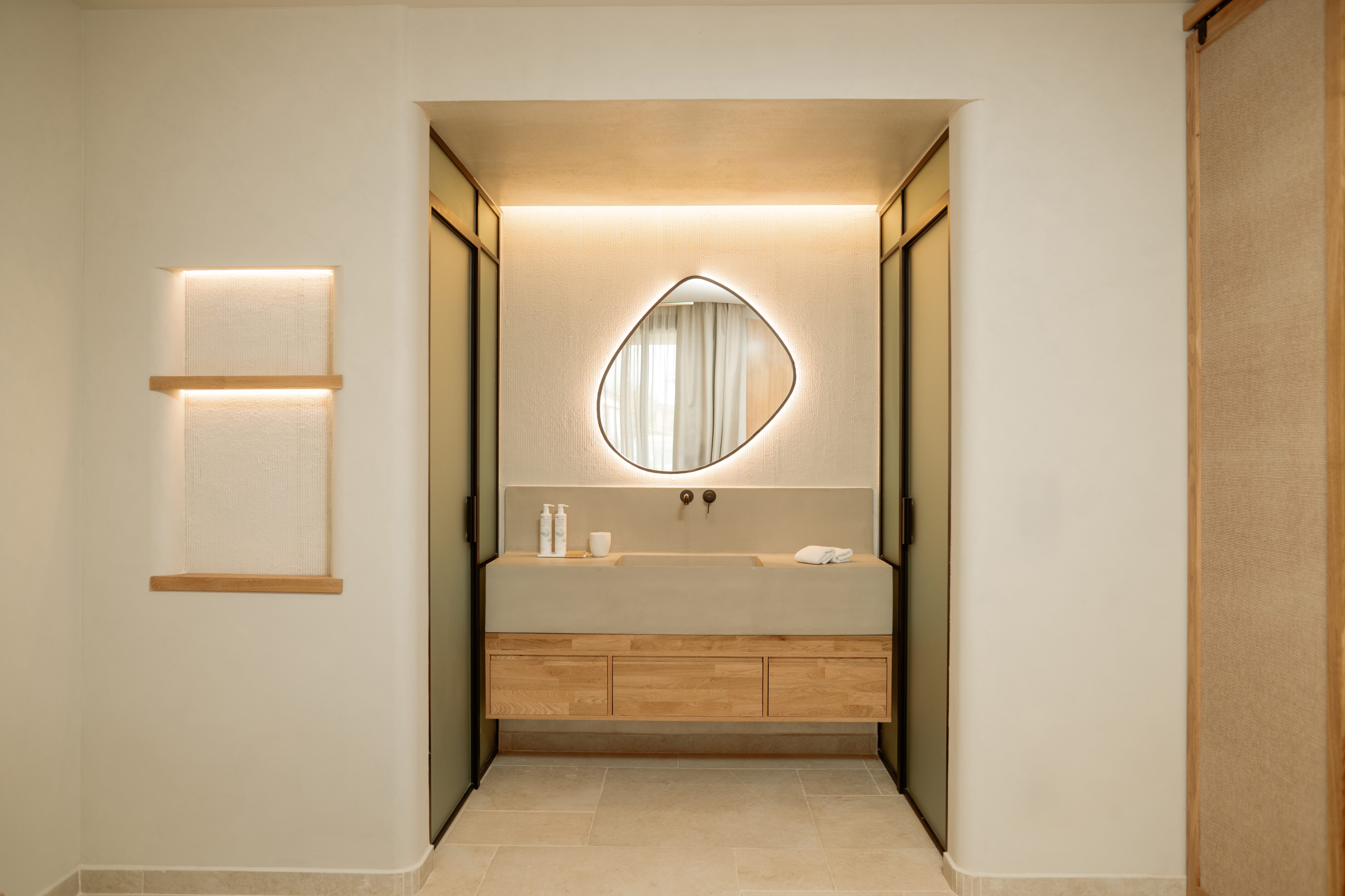 a bathroom with a mirror