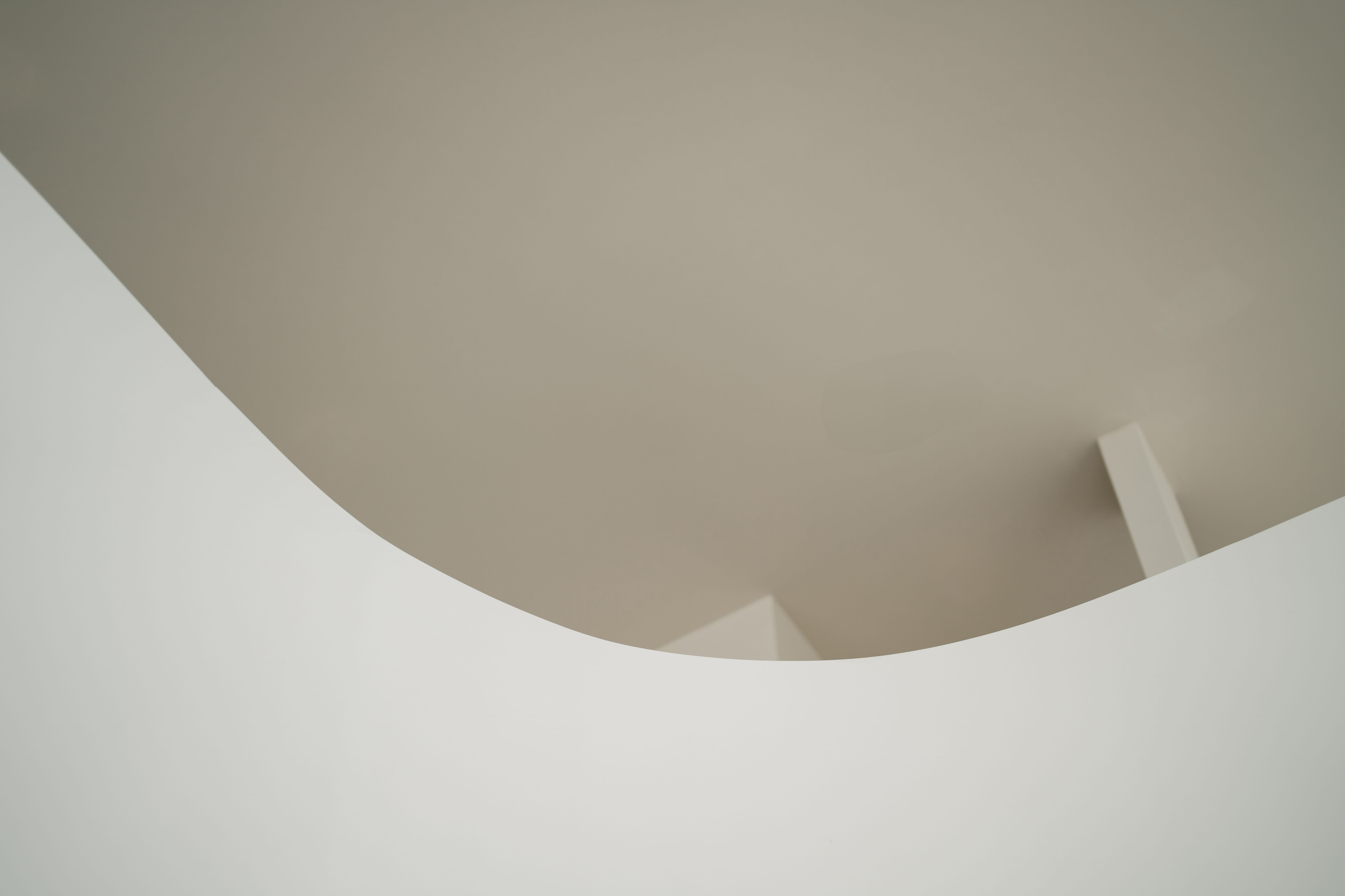 a white ceiling with a light fixture